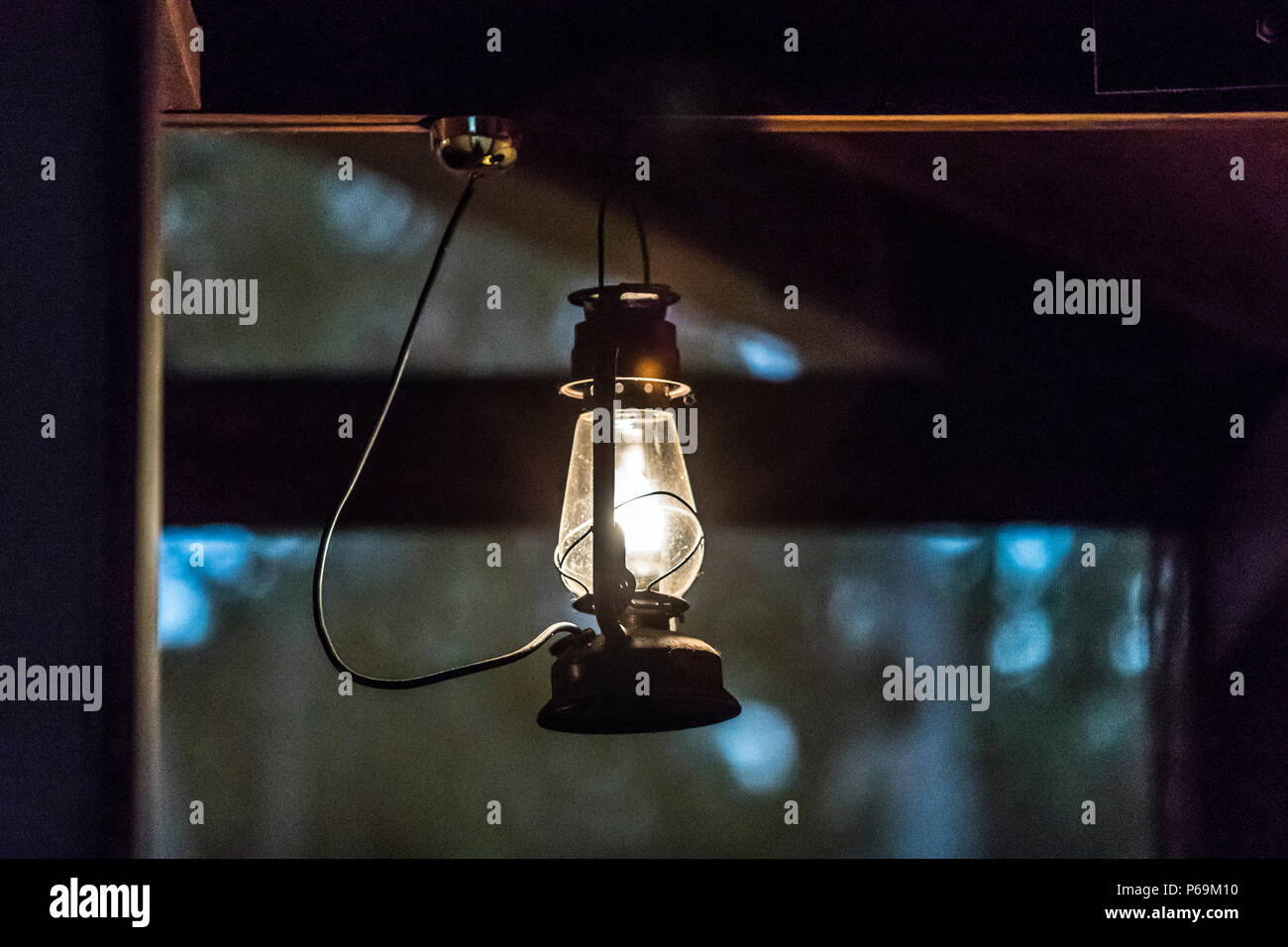 Kerosene lamp at Bamurru Plains Lodge, Northern Territory, Australia. No golden taps but security far away from the metropolises embodies every detail of Bamurru Plains Lodge Stock Photo