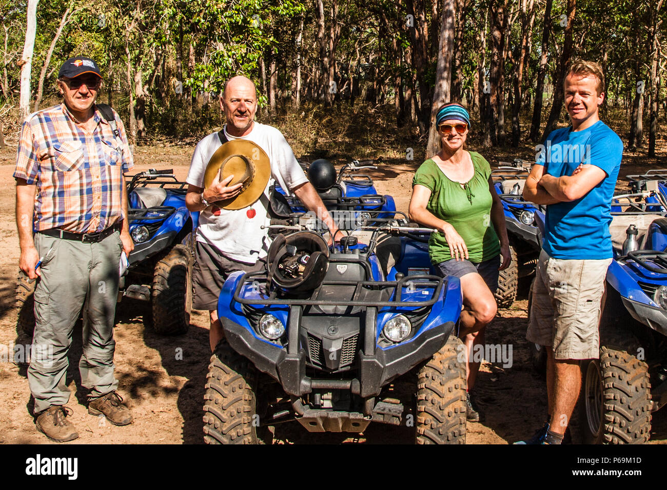 Photographer Georg Berg rides a quad bike across the grounds of Bamurru Plains Lodge, Northern Territory, Australia. Stock Photo