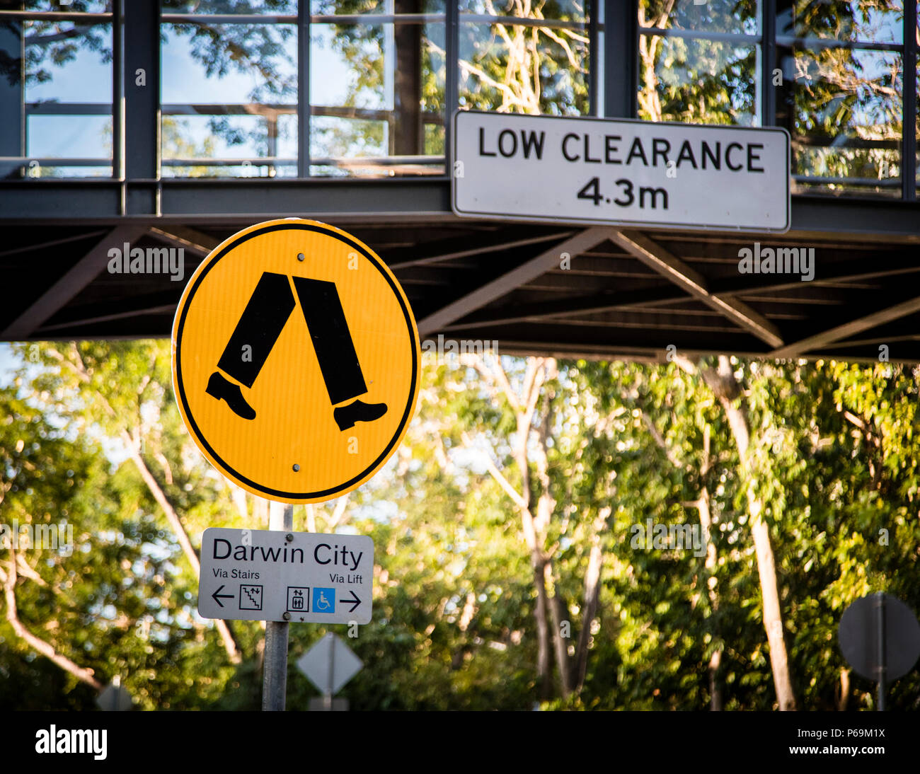 Low Clearance Traffic Sign Darwin Street, Northern Territory, Australia. The reception 'down under' is refreshingly direct. You quickly get used to the left-hand traffic, the Australian traffic signs and the huge dimensions. Stock Photo