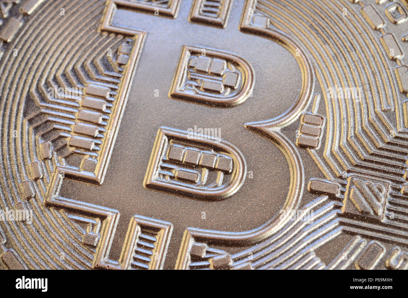Close up shot of a physical bitcoin with a shiny relief surface made of  chocolate. Abstract image of the crypto currency in an edible form Stock  Photo - Alamy