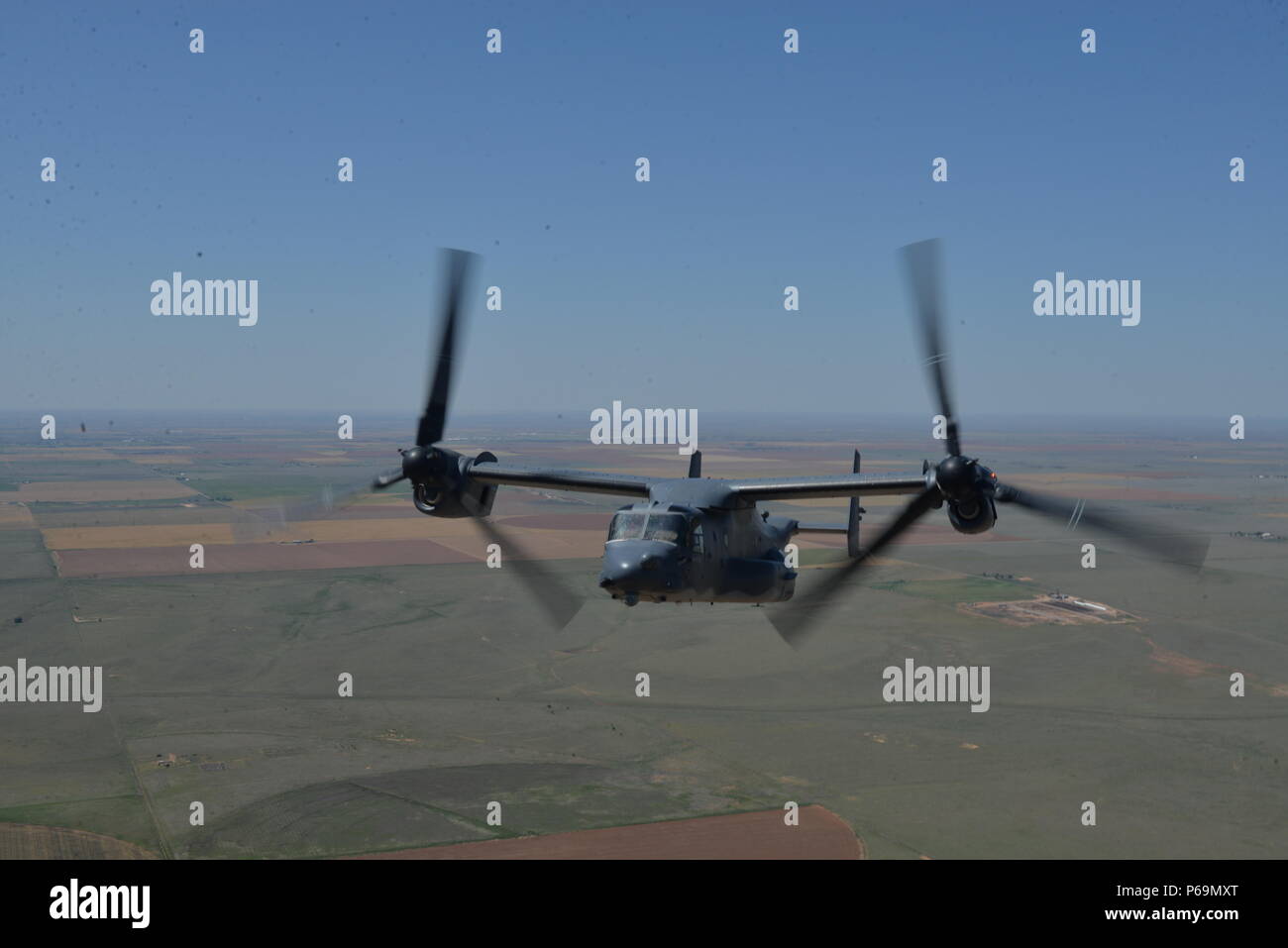 CV-22 Ospreys with the 20th Special Operations Squadron trail behind an ...