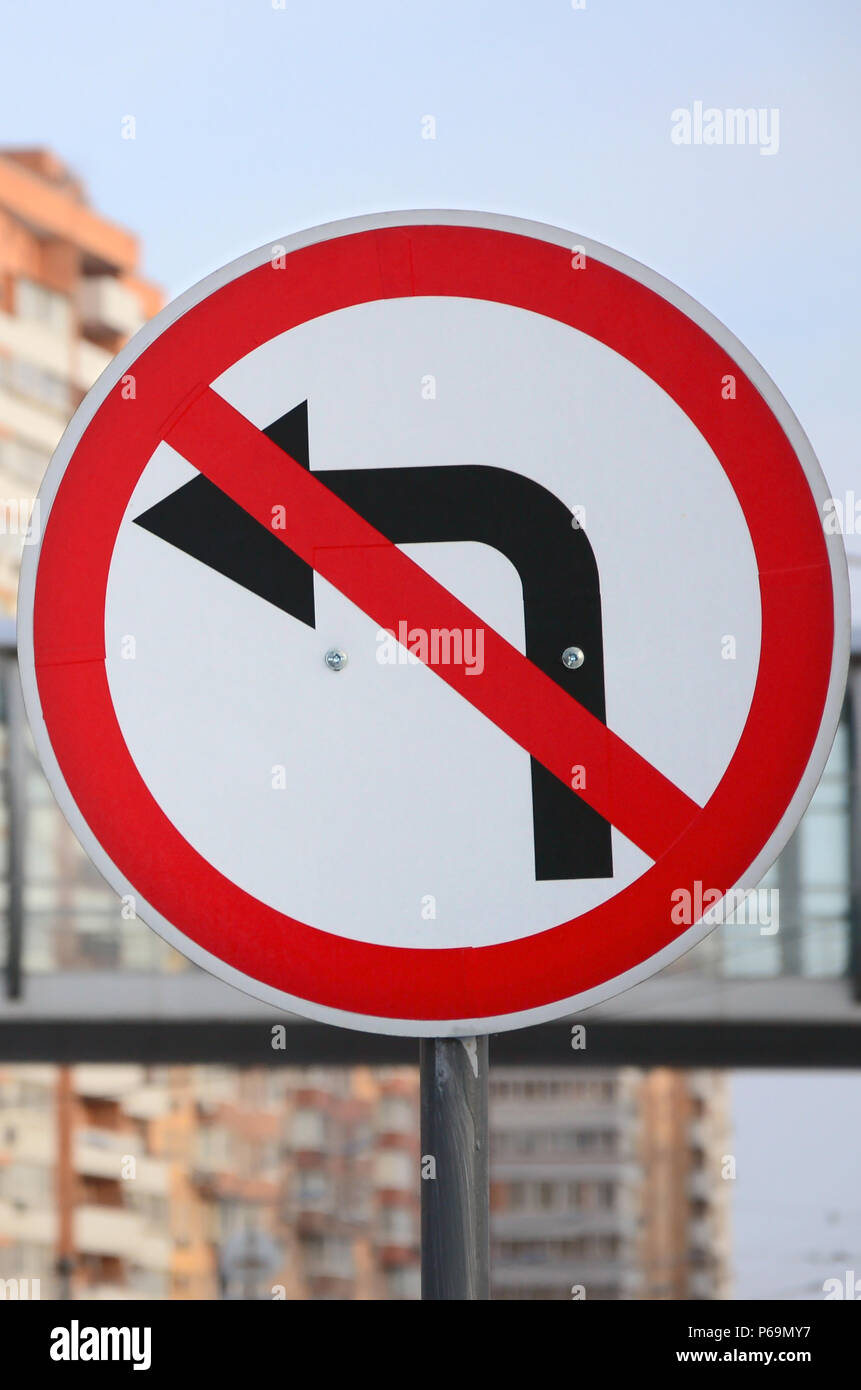 Turn left is prohibited. Traffic sign with crossed out arrow to the