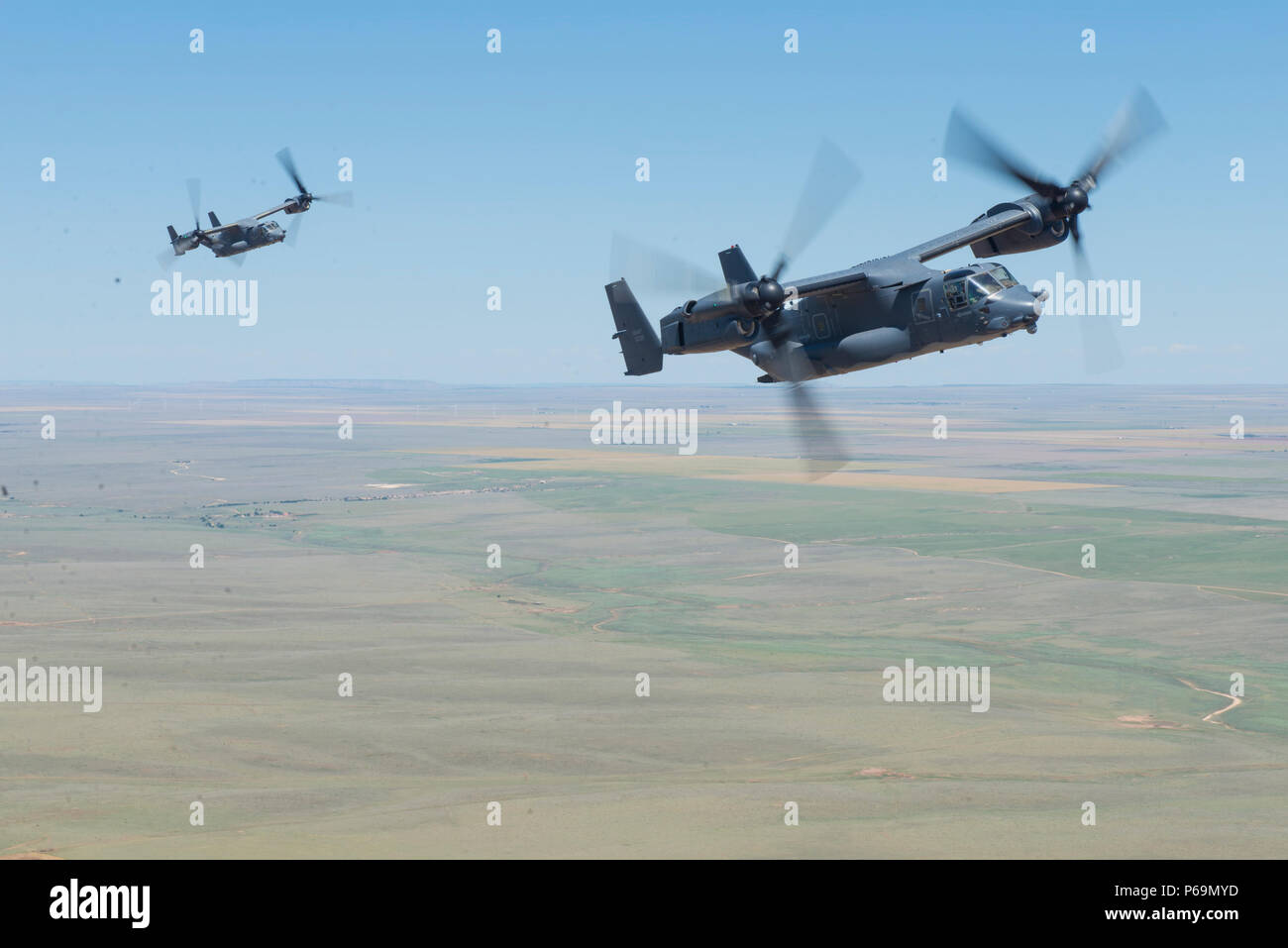 CV-22 Ospreys with the 20th Special Operations Squadron trail behind an ...
