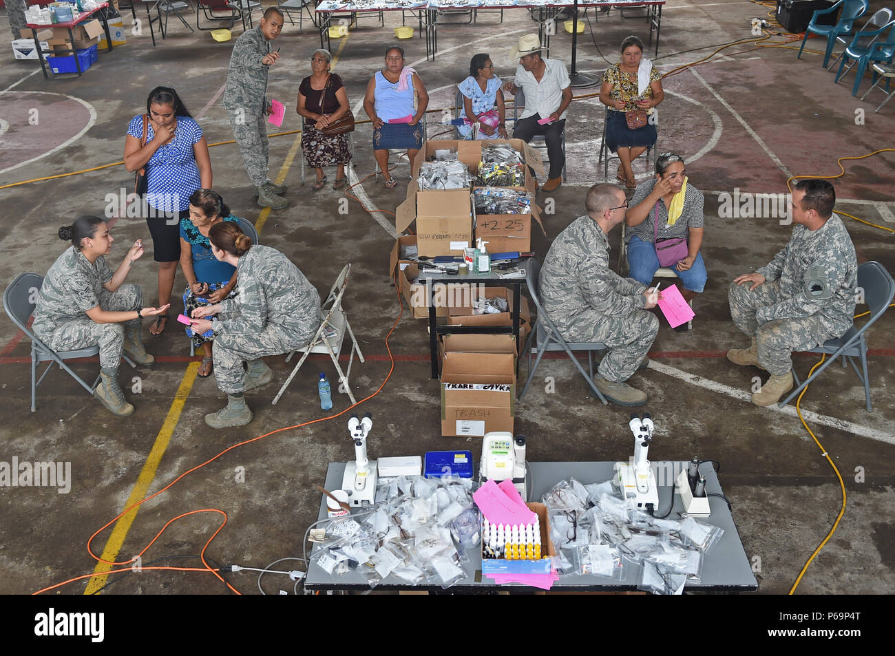 LA BLANCA, Guatemala – U.S. Air Force optometrists and optometry technicians provide eye examinations for Municipality of La Blanca residents at the medical readiness training exercise in La Blanca May 28, 2016, during Exercise BEYOND THE HORIZON 2016 GUATEMALA. Approximately one third of the MEDRETE patients have received services from the optometrists and optometry technicians. (U.S. Air Force photo by Senior Airman Dillon Davis/Released) Stock Photo