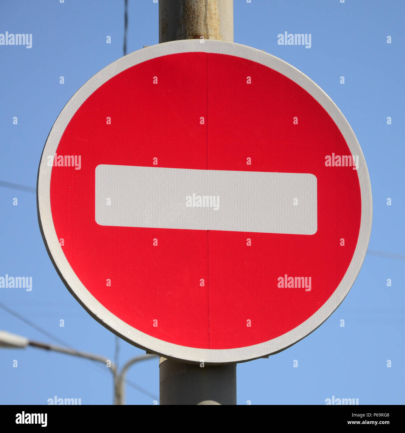 Road sign in the form of a white rectangle in a red circle. No entry