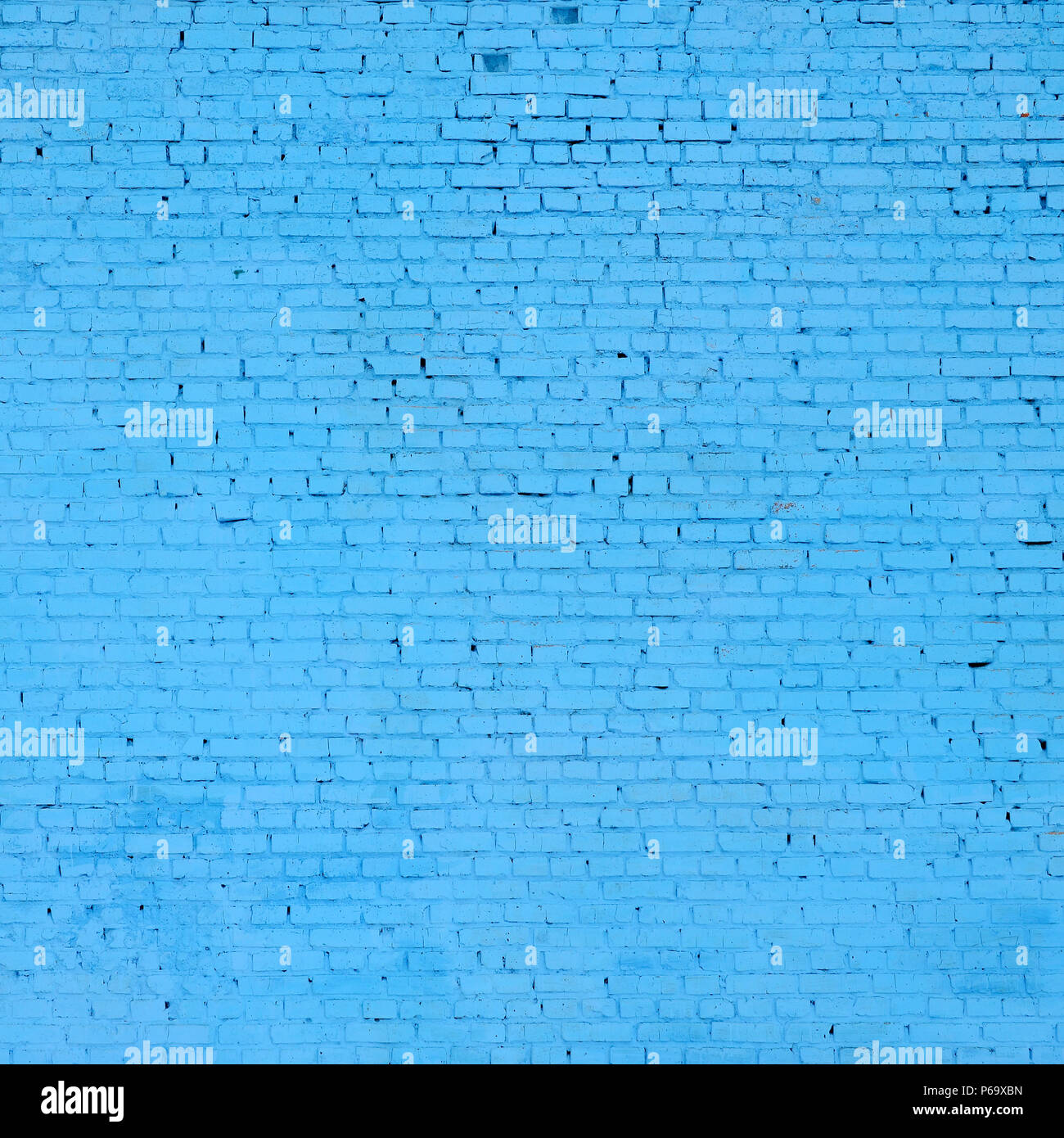 Square brick block wall background and texture. Painted in blue Stock ...