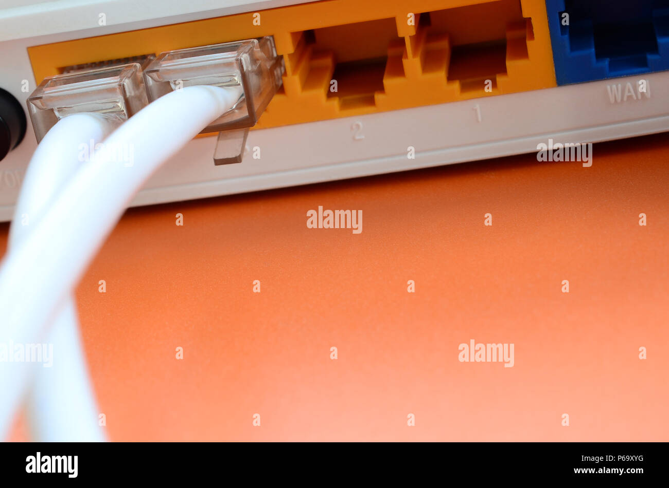 The cable plugs are connected to the router, which