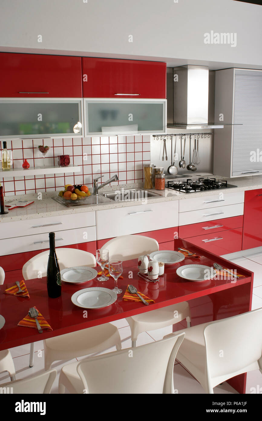 clean modern red kitchen design Stock Photo Alamy