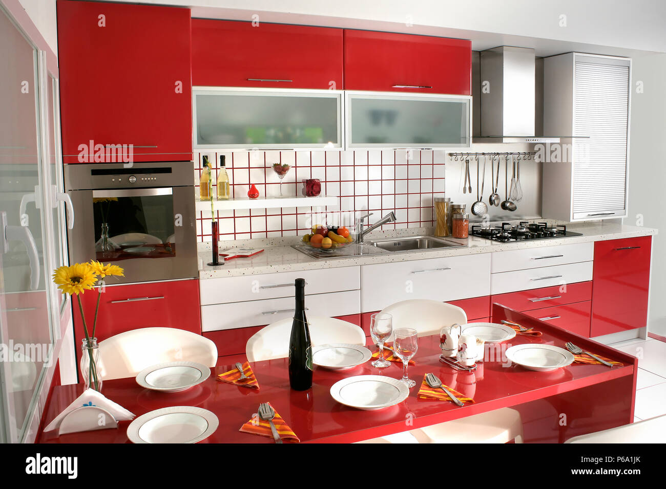 https://c8.alamy.com/comp/P6A1JK/clean-modern-red-kitchen-design-P6A1JK.jpg