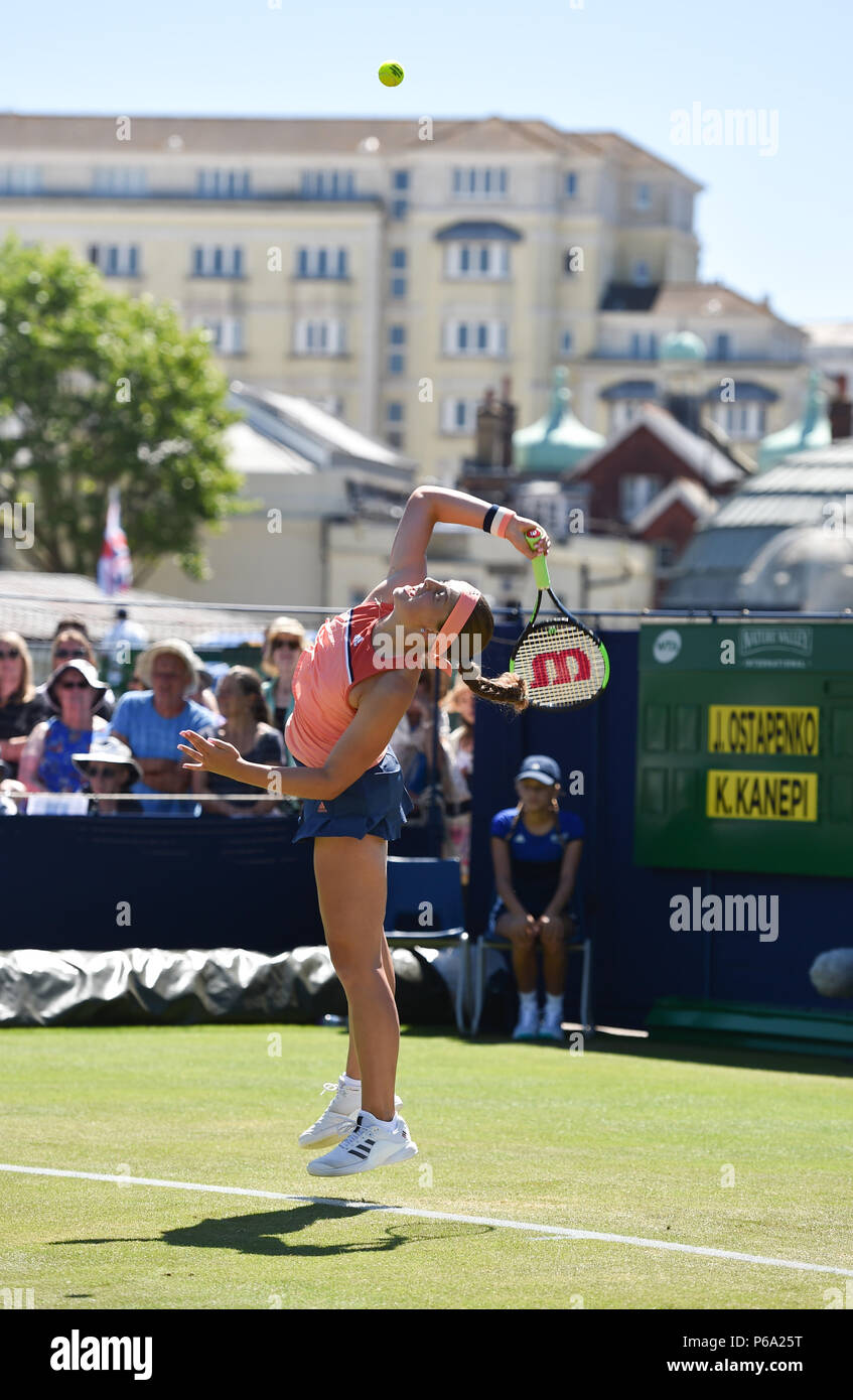 Jelena Ostapenko of Latvia in action against Kaia Kanepi  of Estonia during the Nature Valley International tennis tournament at Devonshire Park in Eastbourne East Sussex UK. 26 June 2018 Stock Photo