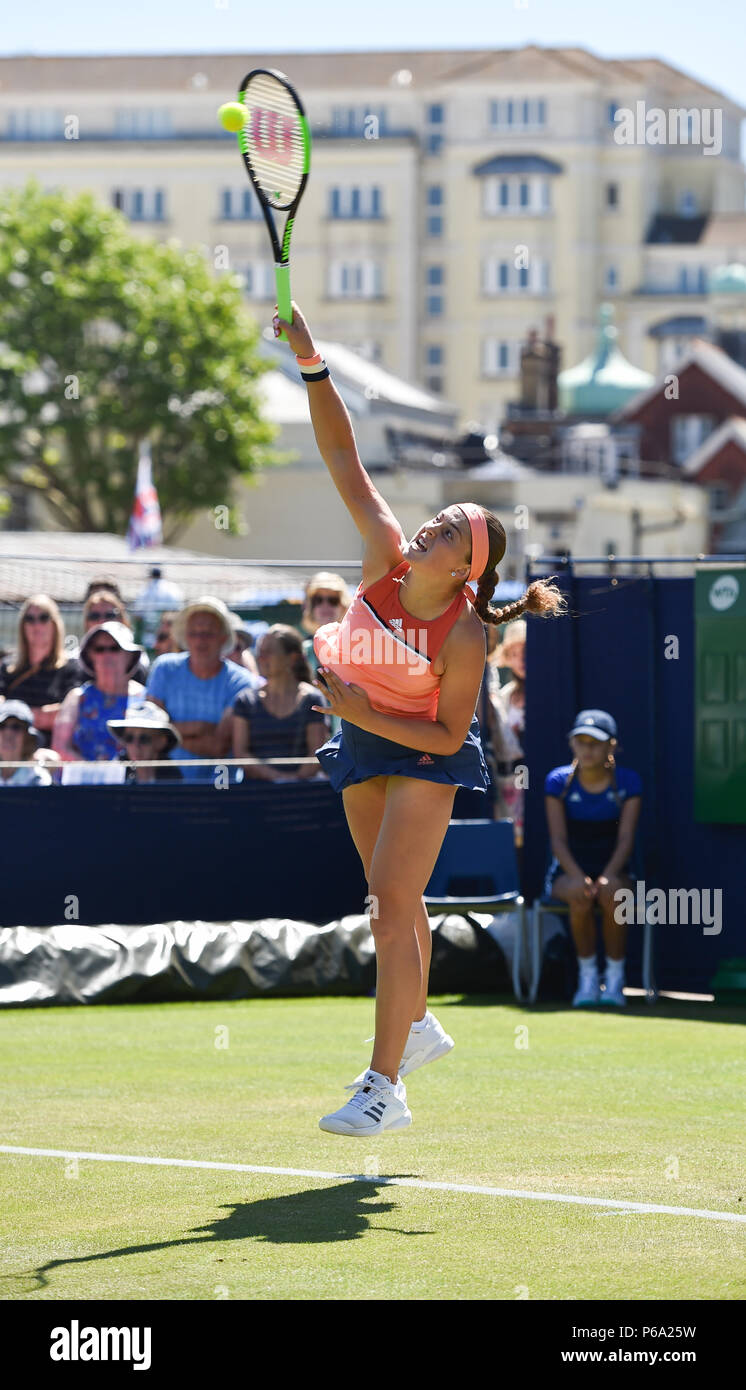Jelena Ostapenko of Latvia in action against Kaia Kanepi  of Estonia during the Nature Valley International tennis tournament at Devonshire Park in Eastbourne East Sussex UK. 26 June 2018 Stock Photo