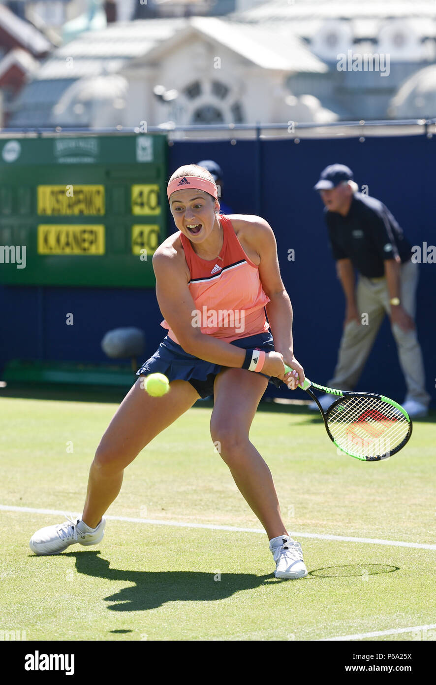 Jelena Ostapenko of Latvia in action against Kaia Kanepi  of Estonia during the Nature Valley International tennis tournament at Devonshire Park in Eastbourne East Sussex UK. 26 June 2018 Stock Photo