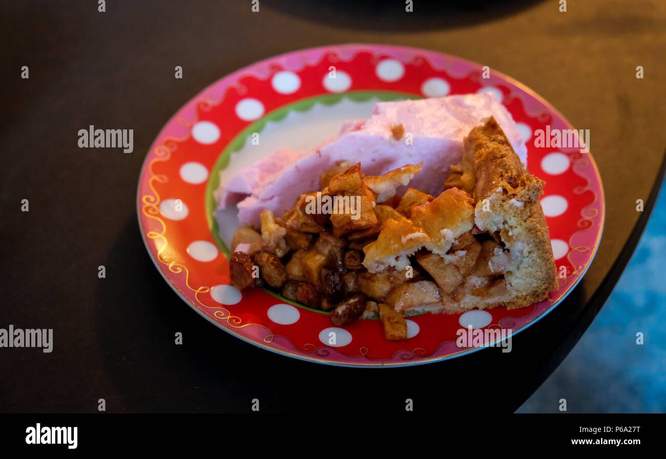Food on a plate on a table in a house Stock Photo
