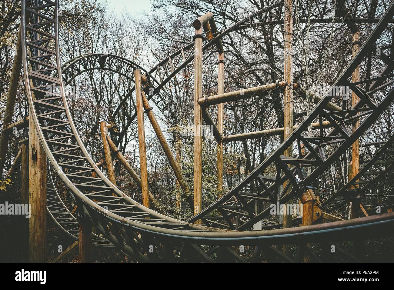 Abandoned theme park roller coaster ride in autumn in europe Stock Photo -  Alamy