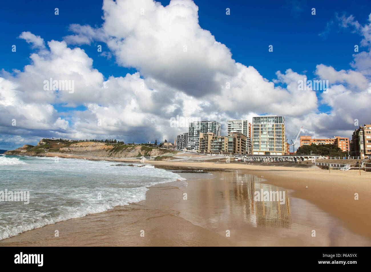 Newcastle beach - One of Newcastle's beautiful beaches on a lovely sunny day. Newcastle is Australia's second oldest city and second largest in New So Stock Photo