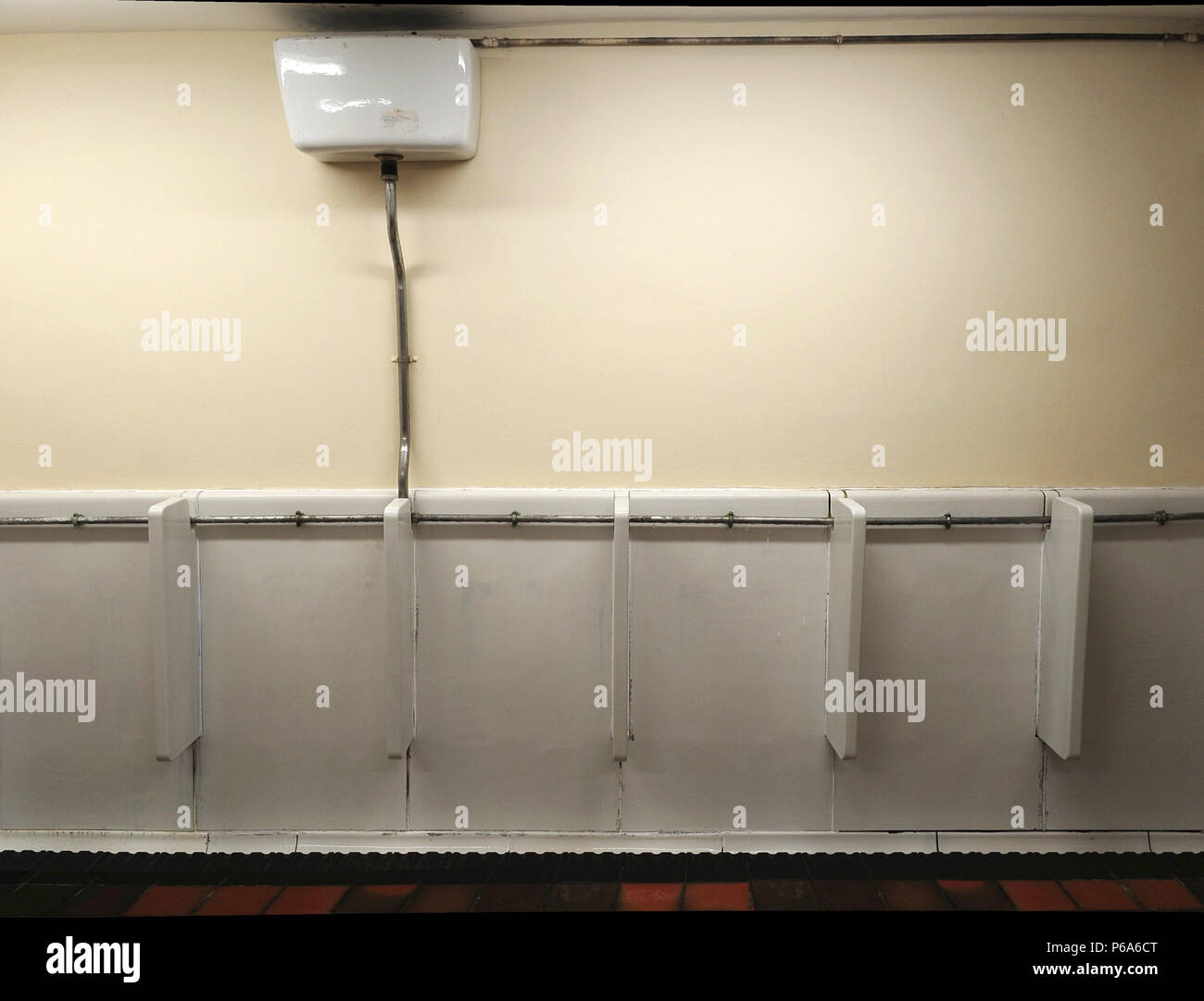A row of gents urinals in a public lavatory Stock Photo