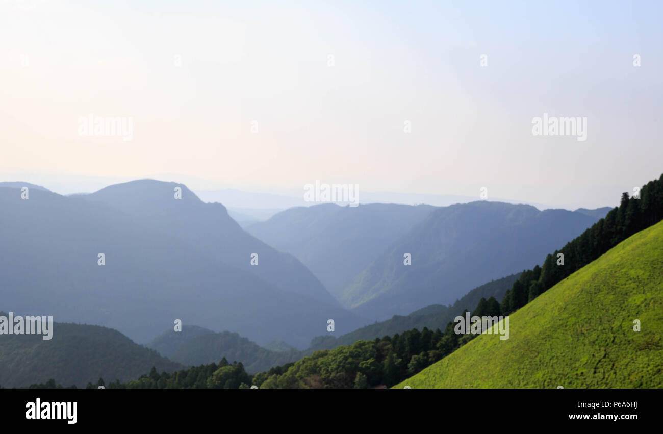 Distant mountains disappear into haze at Soni Kogen in Nara, Japan Stock Photo