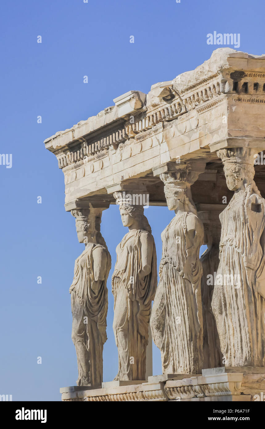 The Cariatides of the Erechtheum on the Acropolis in a sunny say on a blue sky Stock Photo