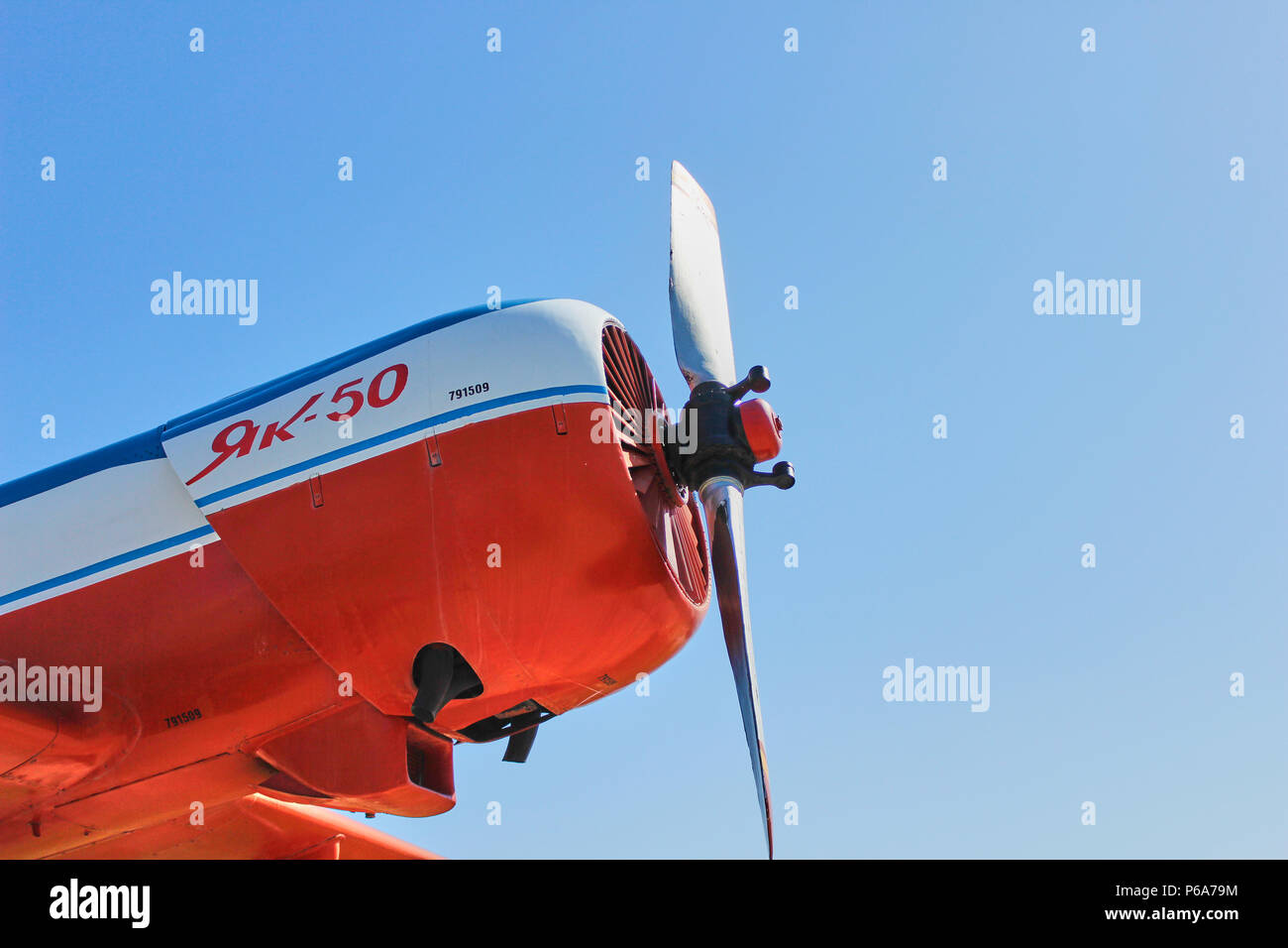 Angle view from below of a old propeller powered soviet plane Yak-50 Stock Photo