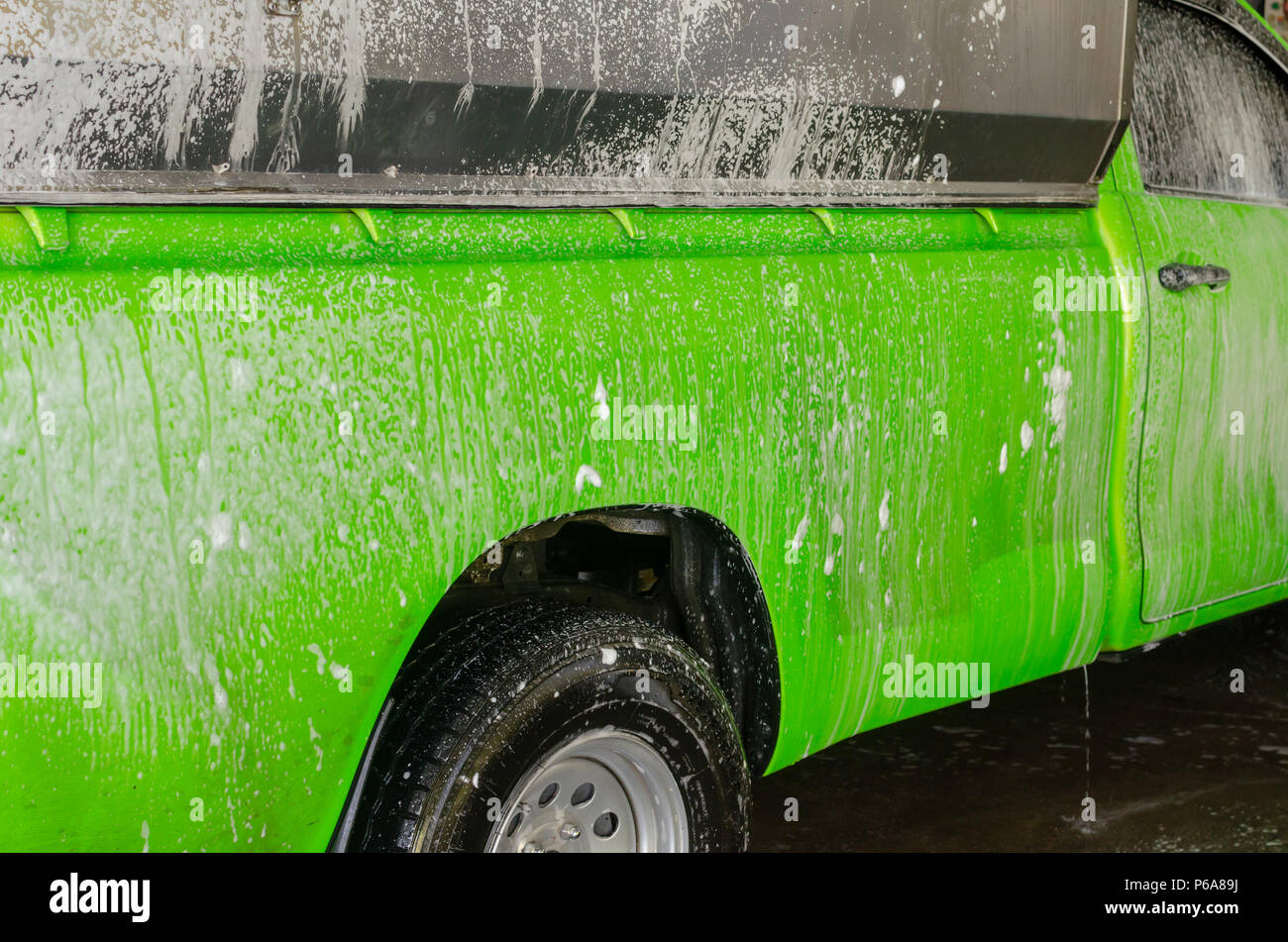 Car wash with foam in car wash Stock Photo Alamy