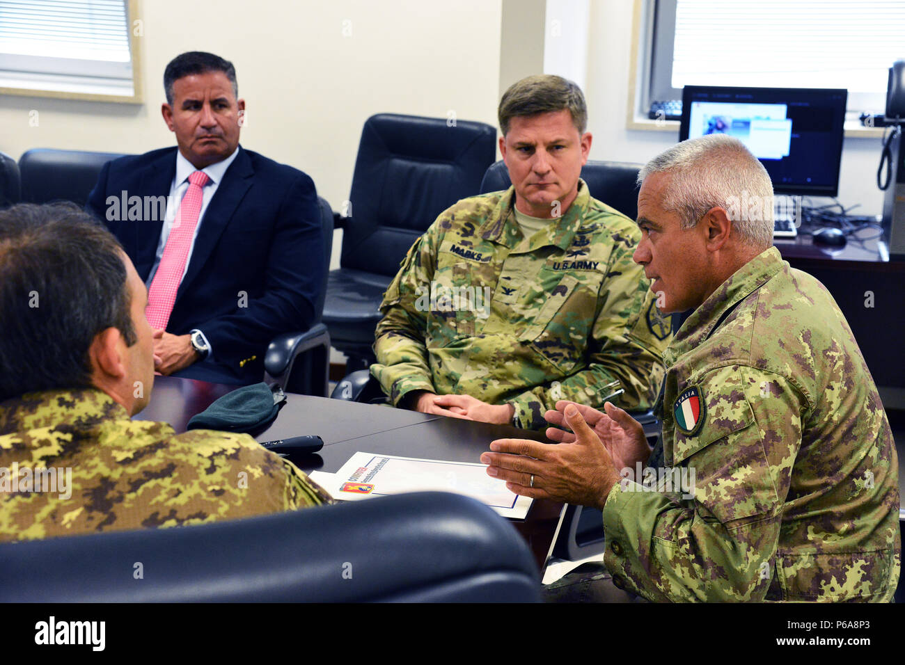 Director Seifert Charles Matthew, Directorate of Plans Training Mobilization and Security “DPTMS” (left), Colonel Steven M. Marks, commander United States Army Garrison Italy (center), Italian Army Colonel Federico Pognant Airassa, Public Information Officer Command of land forces operational “COMFOTER” (right), during the meeting media strategies in Caserma Ederle, Vicenza, Italy, May 31, 2016. Italian Army visit U.S. Army, in order to enhance to bilateral relations and to expand levels of cooperation and the capacity of the personnel involved in joint operations. (Photo by Visual Information Stock Photo