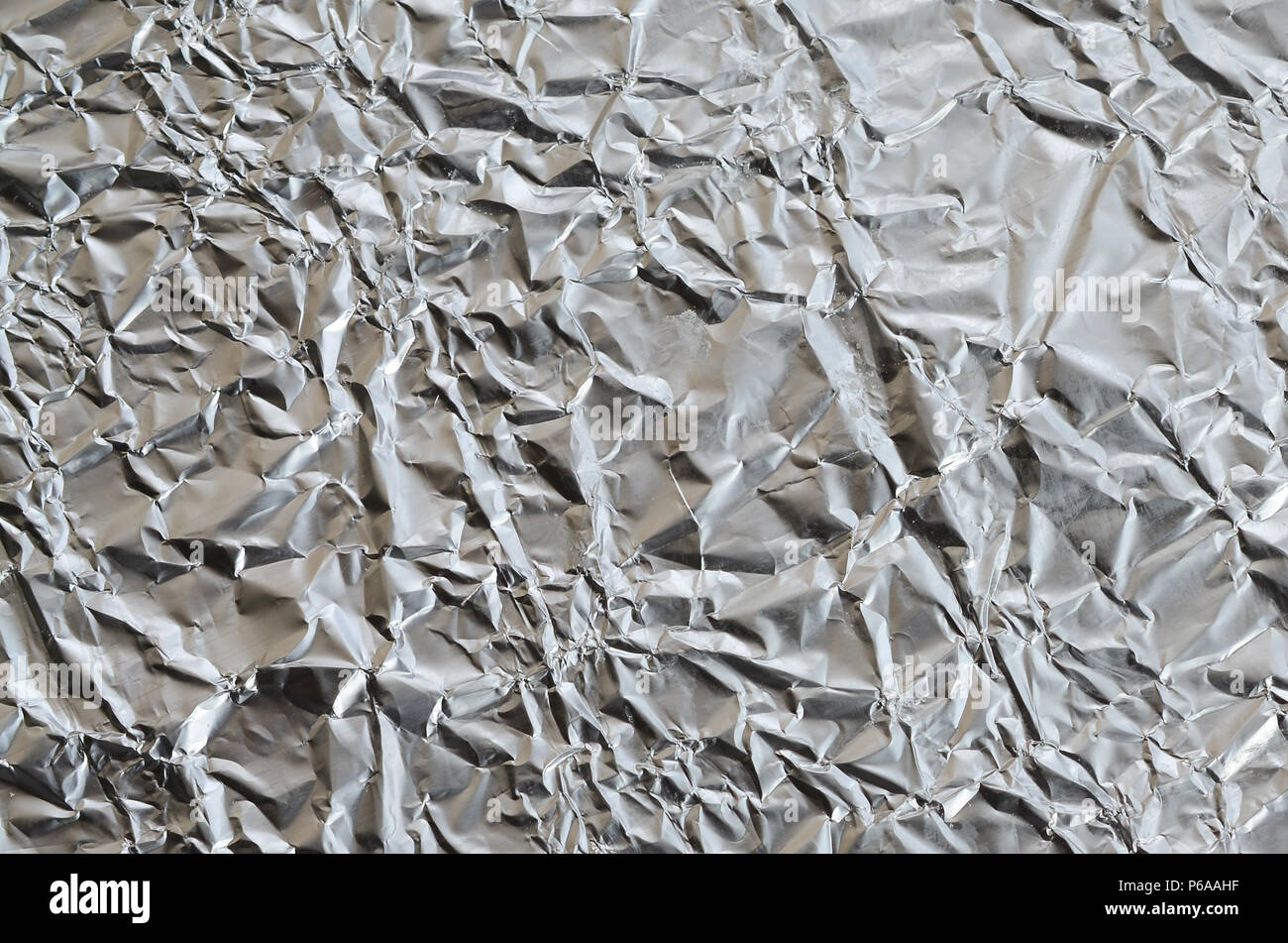 Full Frame Take Of A Sheet Of Crumpled Silver Aluminum Foil Stock Photo -  Download Image Now - iStock