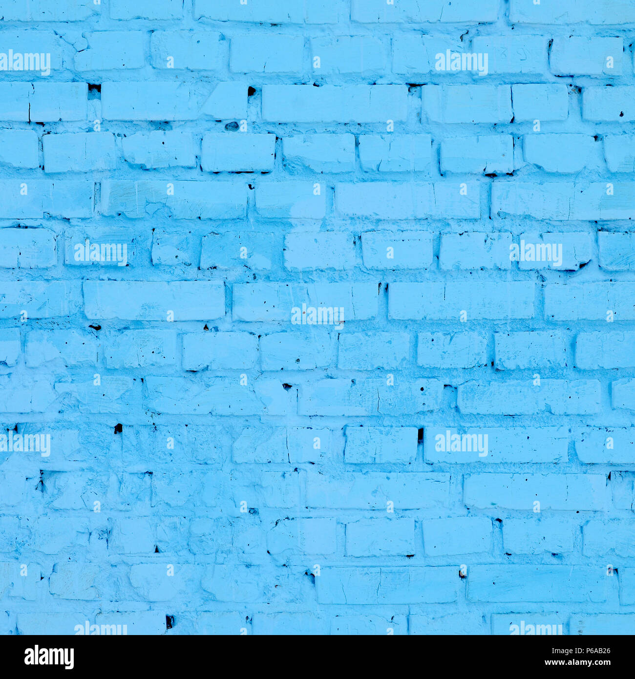 Square brick block wall background and texture. Painted in blue Stock ...
