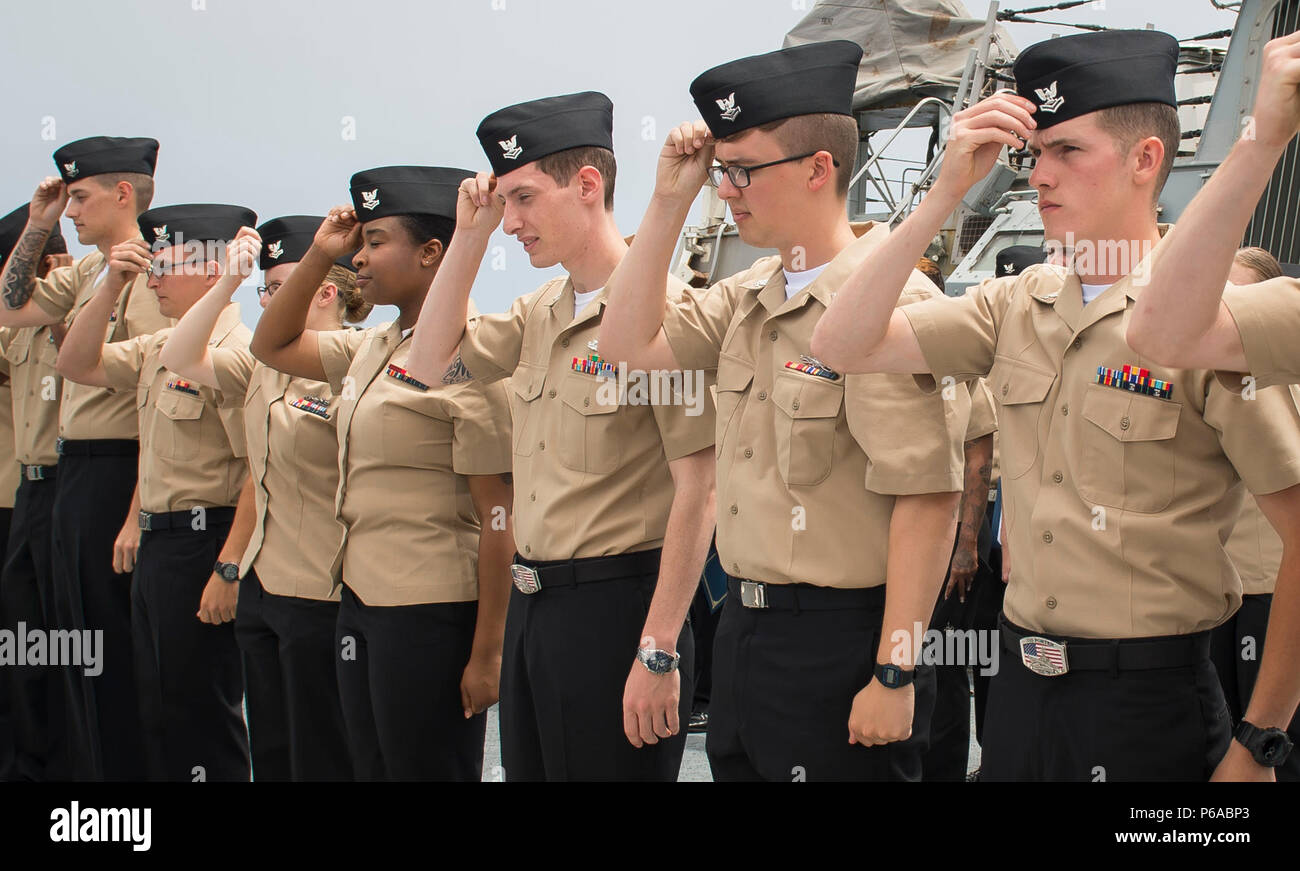160531-N-FQ994-107 MEDITERRANEAN SEA (May 31, 2016) Sailors aboard USS  Porter (DDG 78) don Second Class Petty Officer garrison caps during a  frocking ceremony May 31, 2016. Porter, an Arleigh Burke-class  guided-missile destroyer,