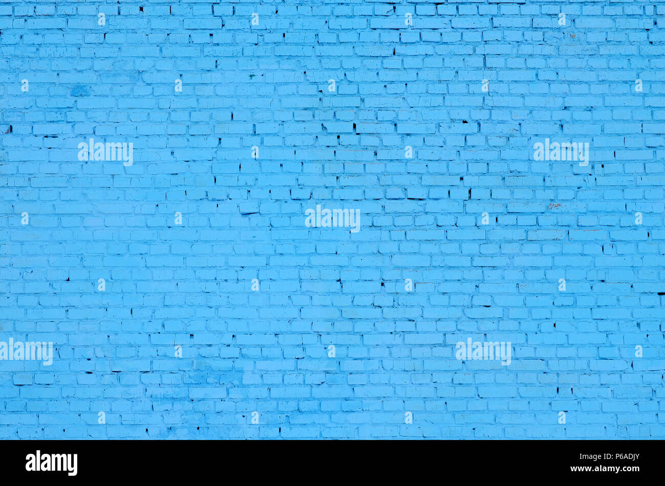 Square brick block wall background and texture. Painted in blue Stock ...