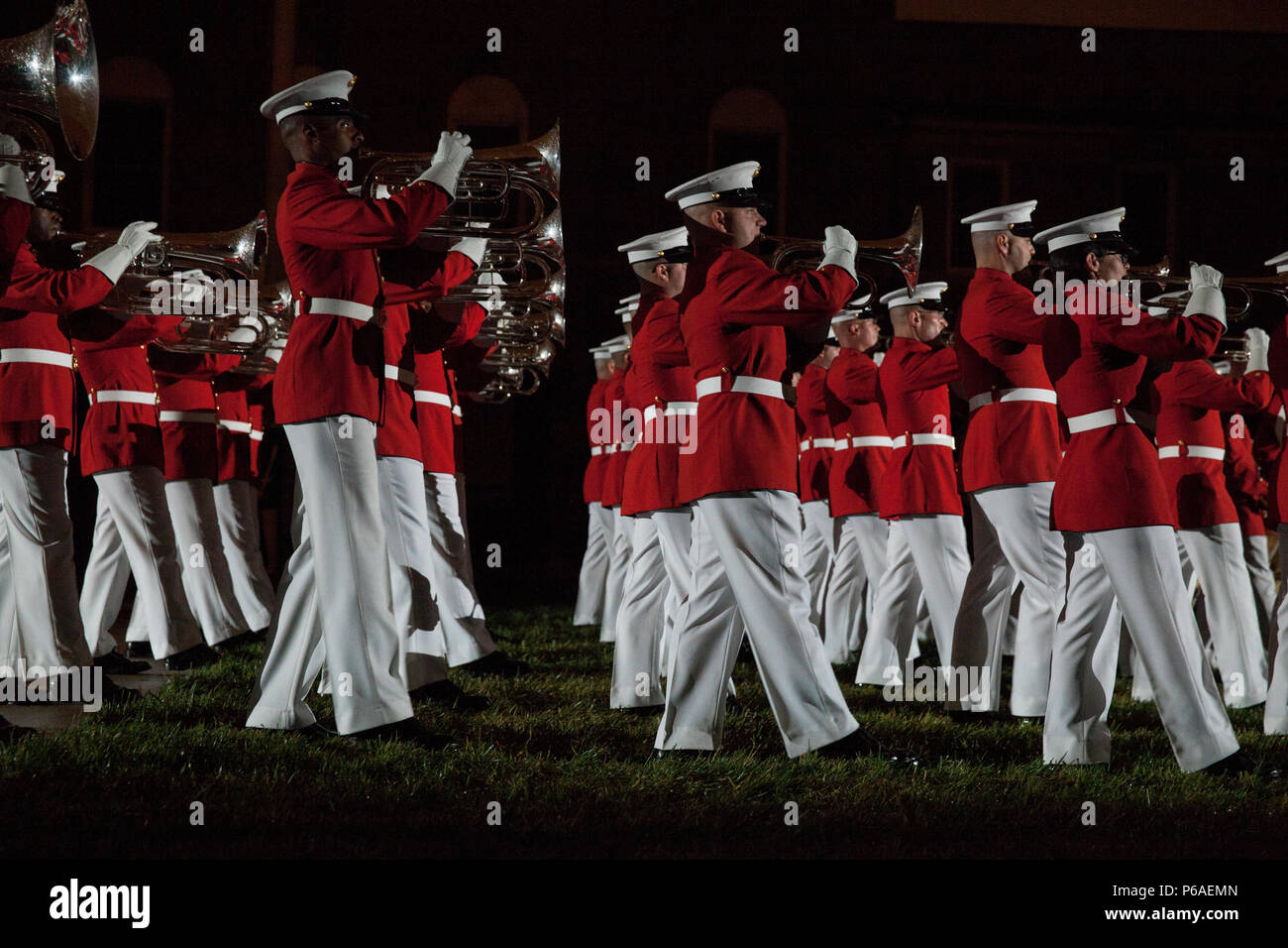 Members of the U.S. Marine Corps Drum and Bugle Corps perform during an evening parade at Marine Barracks Washington, Washington, D.C., April. 29, 2016. The guest of honor was Gen. Robert B. Neller, the 37th commandant of the Marine Corps, and the hosting official was Col. Benjamin T. Watson, commanding officer, Marines Barracks Washington. The evening parade summer tradition began in 1934 and features the Silent Drill Platoon, the U.S. Marine Band, the U.S. Marine Drum and Bugle Corps and two marching companies. More than 3,500 guests attend the parade every week. (U.S. Marine Corps photo by Stock Photo