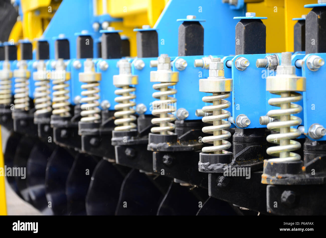 Multiweeder Spring Spring system of agricultural seeder close up Stock Photo - Alamy