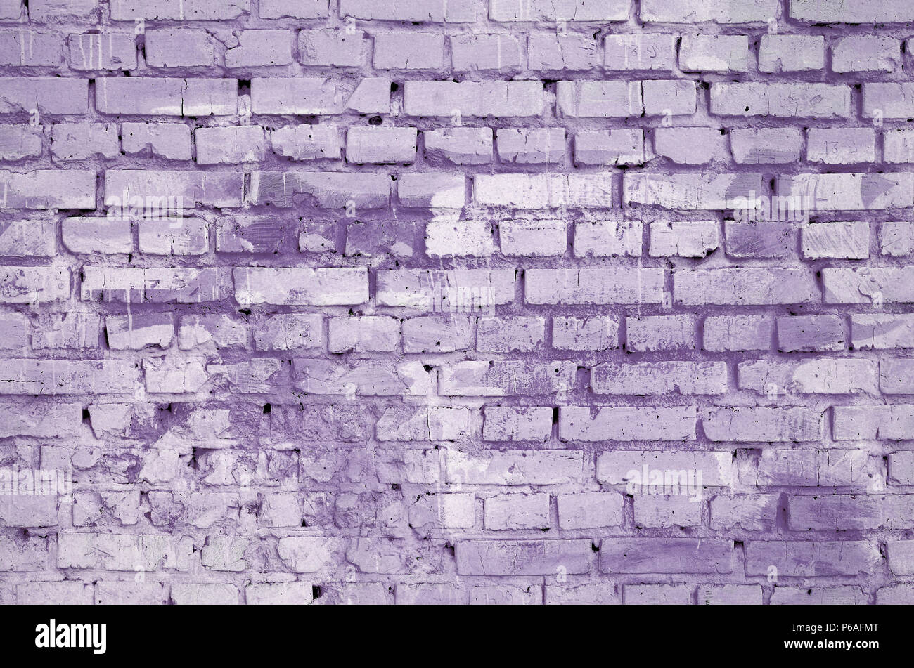 Square brick block wall background and texture. Painted in violet . Stock Photo