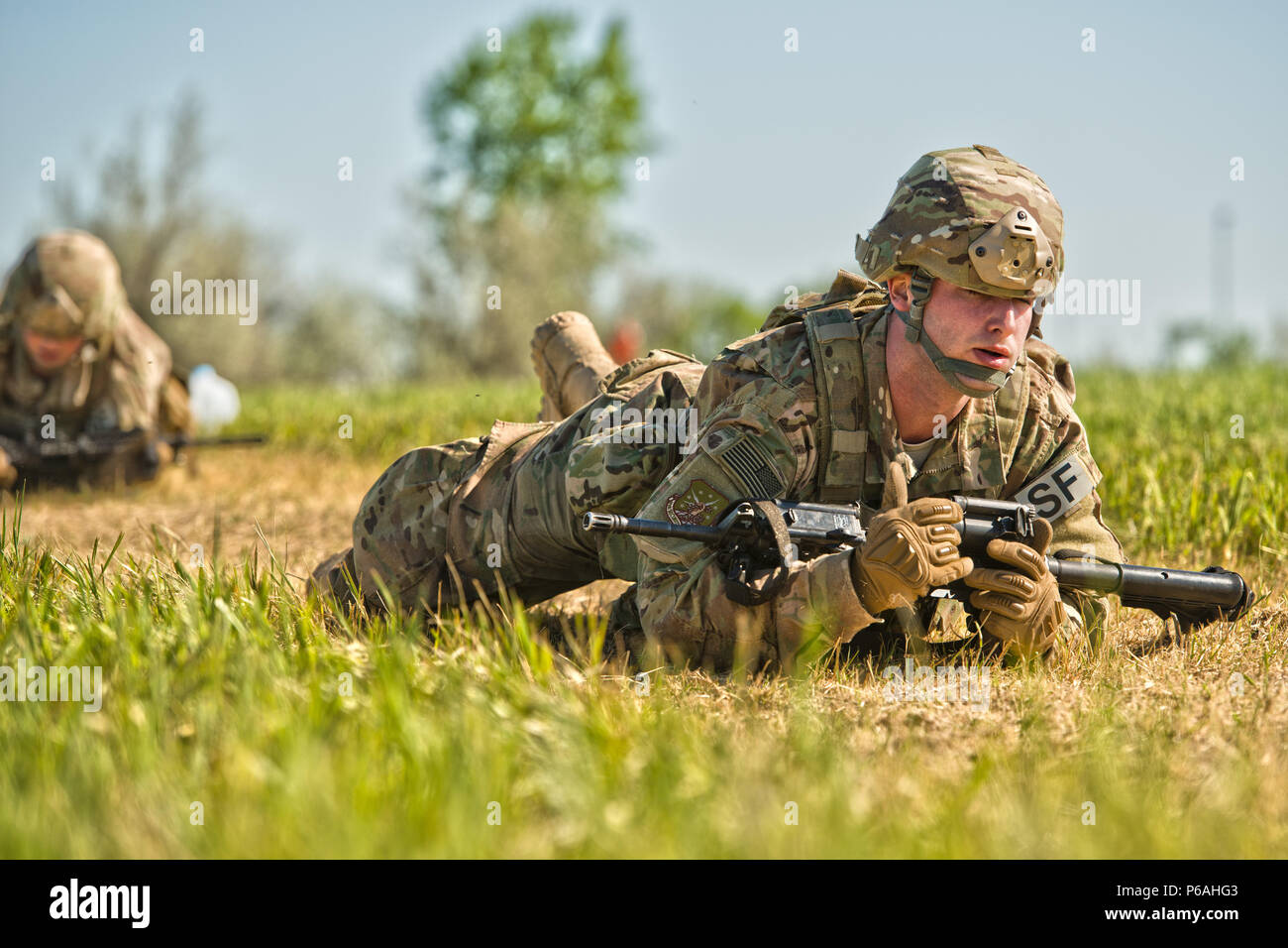 Defenders from the 791st Missile  Security Forces Squadron participated in annual tactical training at Minot Air Force Base, N.D., May 23, 2016. Training stations allowed SF members to practice small unit combat tactics, employ inert smoke grenades and perform casualty care and evacuation. These exercises were just a small portion of the tactical maneuver training SF members receive annually. (U.S. Air Force photos/Airman 1st Class J.T. Armstrong) Stock Photo