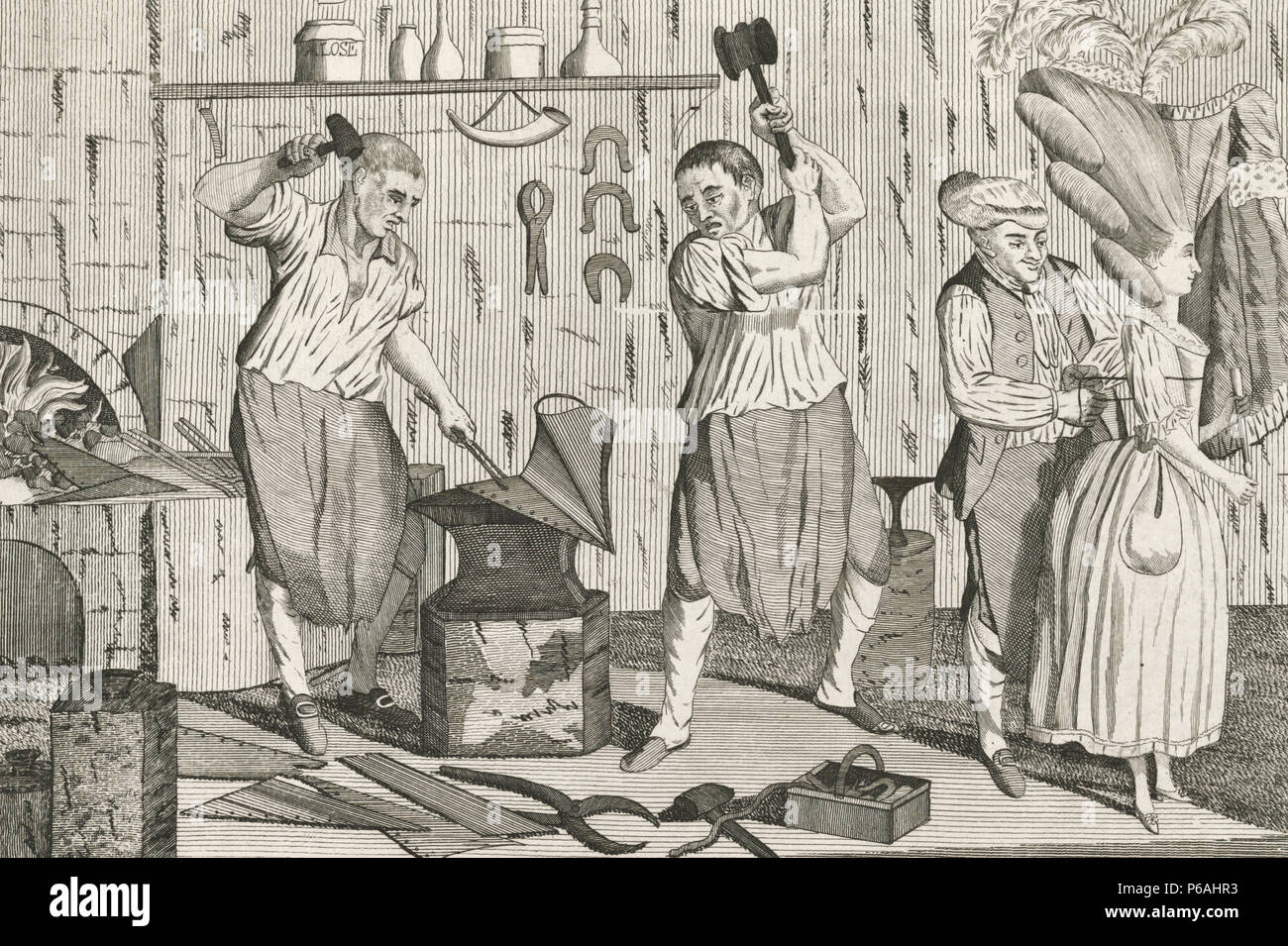 Bath stays or The lady's steel shapes -  'The interior of a blacksmith's smithy. On the anvil is a portion of a pair of stays, at which two smiths strike with hammers, one (left) holding the stays by pincers...' June 4, 1777. Stock Photo