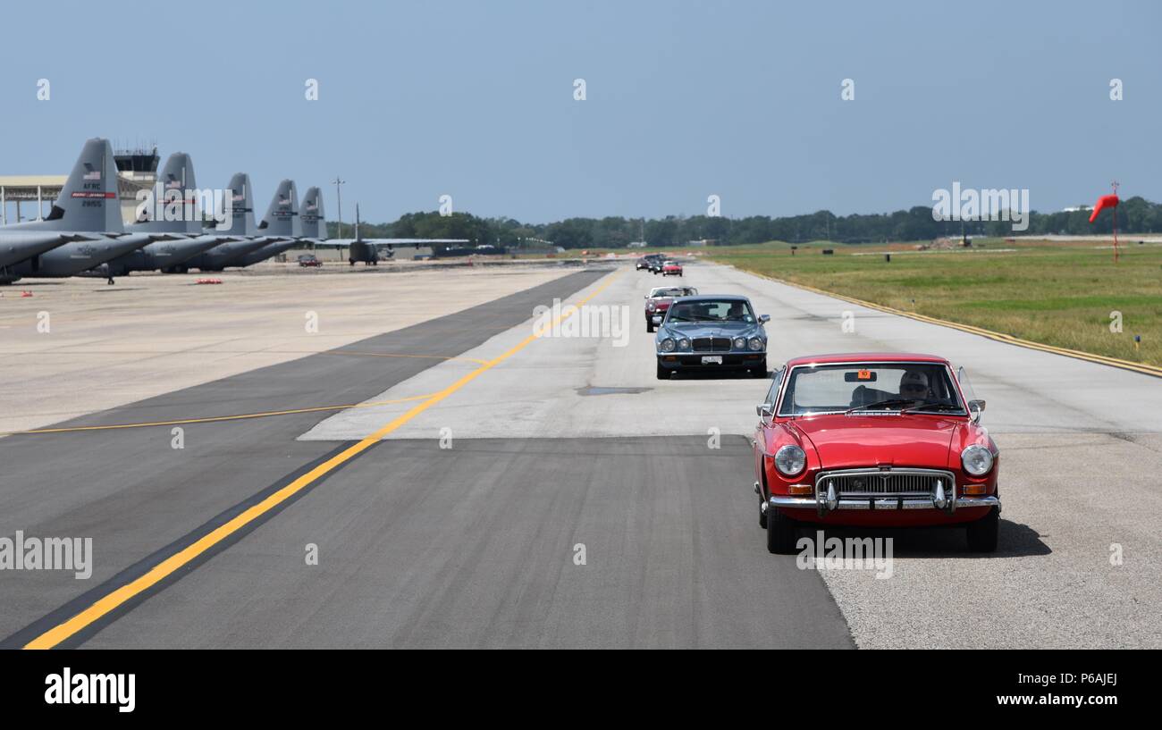 The British Car Club of New Orleans commemorated the Post World War II use of U.S. Air Force runways for auto racing by driving down the Keesler Air Force Base, Mississippi, runway May 21, 2016. In the Post-WWII era of early U.S. auto racing, there were several tragedies due to people racing on roadways. This mandated the move from road racing to tracks. However, before the tracks were ready, Gen. Curtis LeMay, a sports car enthusiast, allowed the use of U.S. Air Force runways at Strategic Air Command bases to the Sports Car Club of America for racing. The first two SCCA champions in 1951 and  Stock Photo