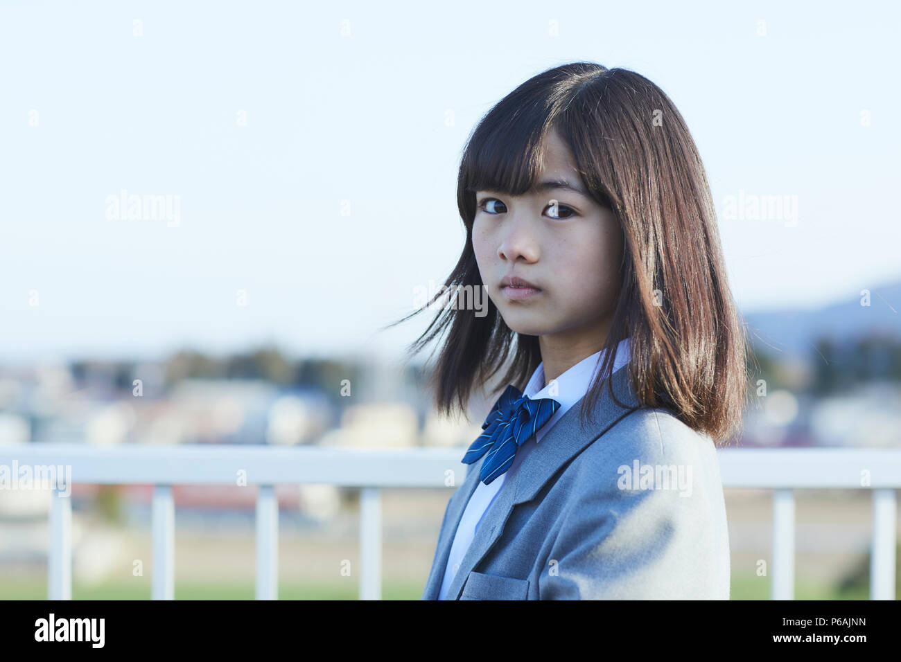 Moody girl school uniform hi-res stock photography and images - Alamy
