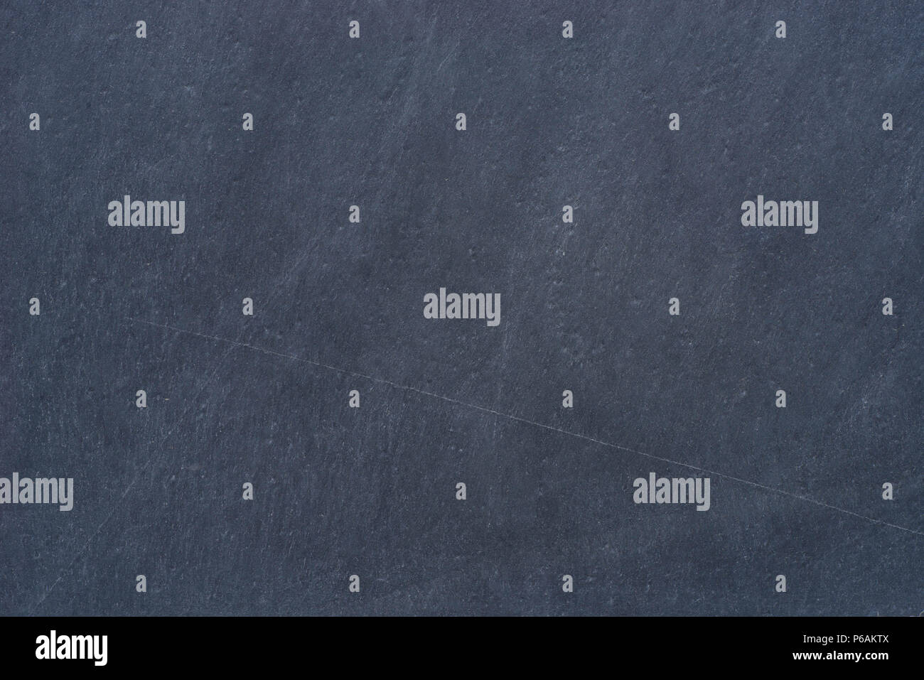 black metamorphic rock texture background closeup Stock Photo - Alamy