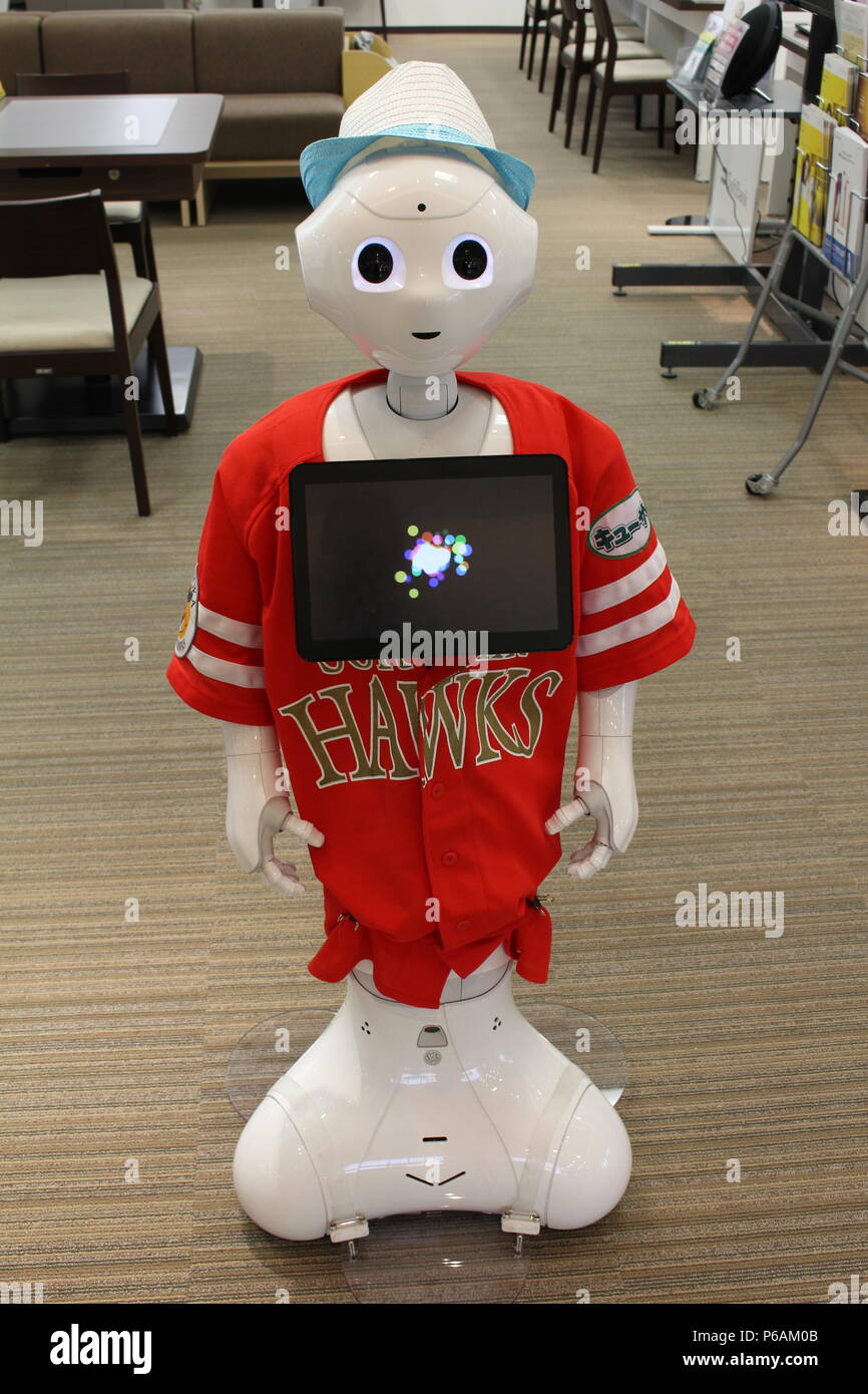 A Pepper robot working at a Softbank store in Chiba City, Japan. It's  wearing a Softbank Hawks kit, a team sponsored by the company. (6/2018  Stock Photo - Alamy