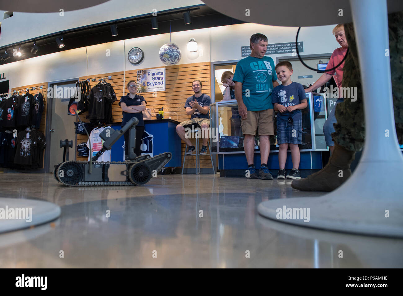 RENO, Nev. (June 22, 2018) An iRobot 310 Small Unmanned Ground Vehicle is operated by Navy Diver 2nd Class Keoni Chiles, assigned to Southwest Regional Maintenance Center Alpha Dive Team, at the Fleischmann Planetarium in support of Reno/Carson City Navy Week. The Navy Office of Community Outreach uses the Navy Week program to bring Navy Sailors, equipment and displays to approximately 15 American cities each year for a week-long schedule of outreach engagements. (U.S. Navy photo by Mass Communication Specialist 3rd Class Abigayle Lutz/Released) Stock Photo