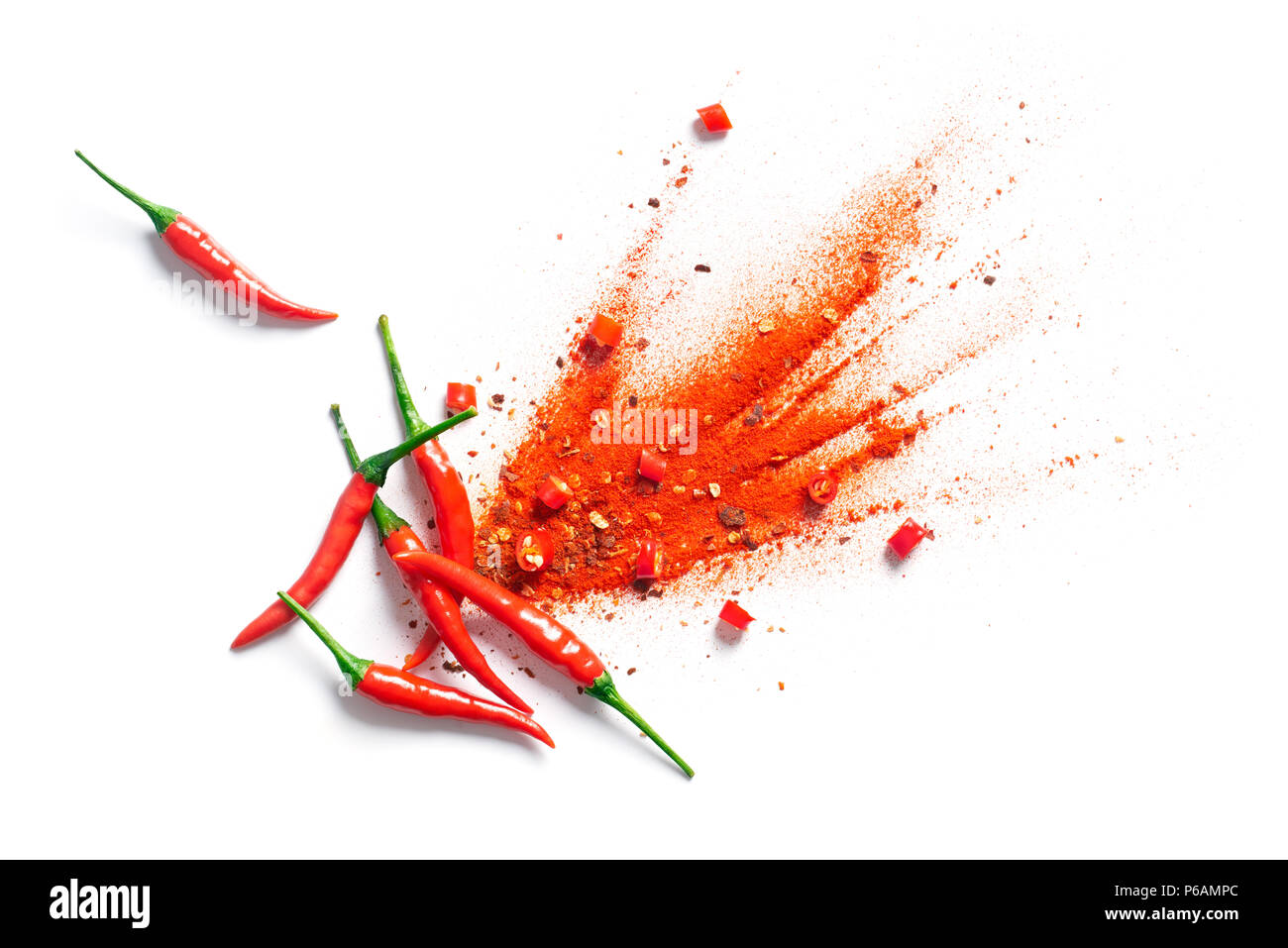 Chili, red pepper flakes and chili powder burst Stock Photo Alamy