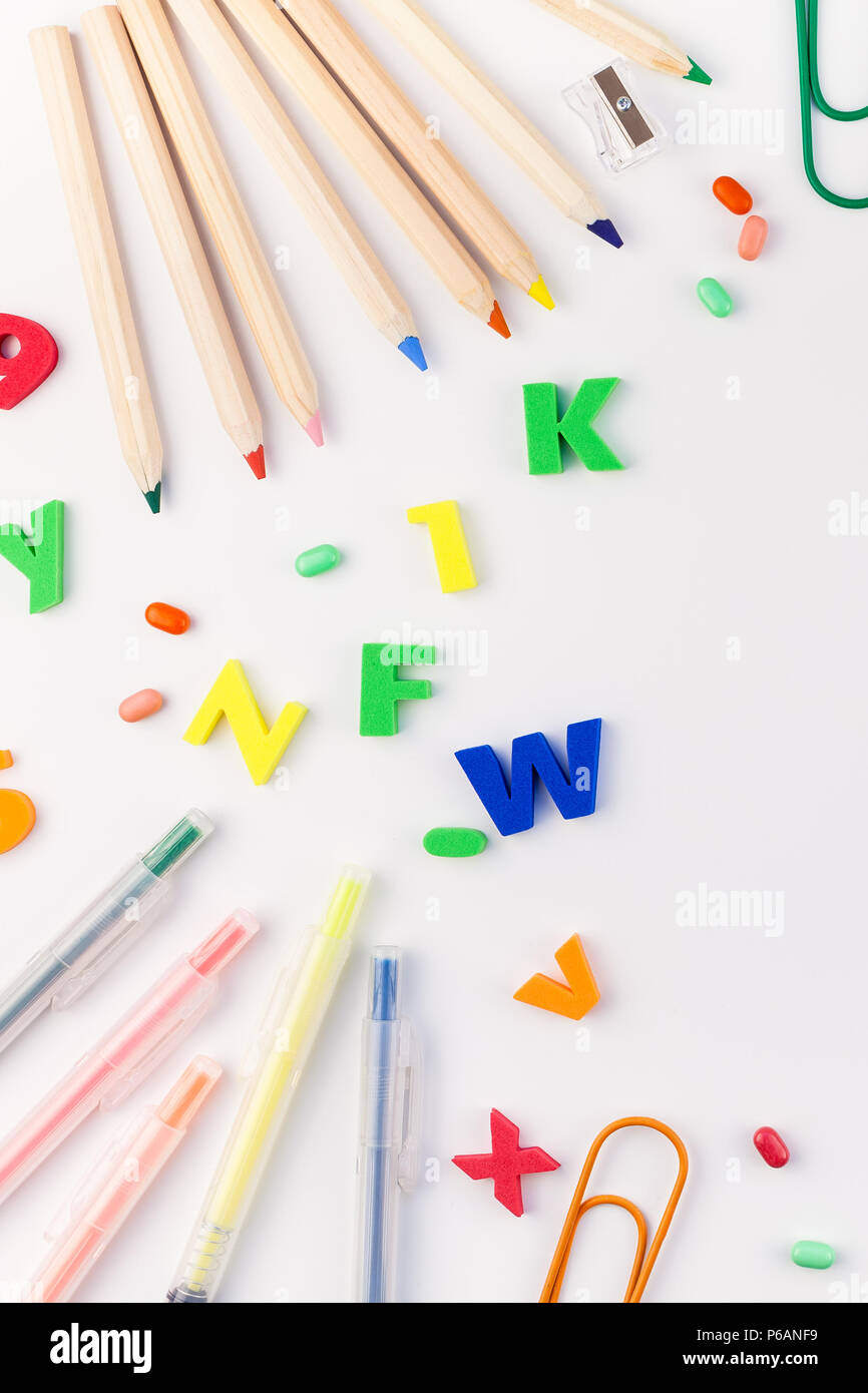 Creative flat lay back to school concept with color school and office ...