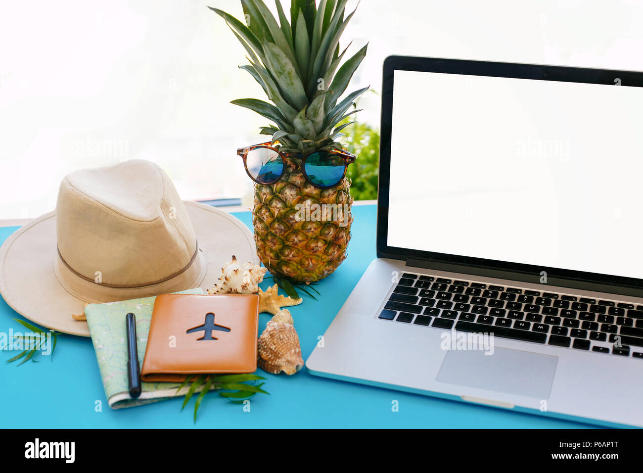 Planning vacation laptop map hi-res stock photography and images - Alamy