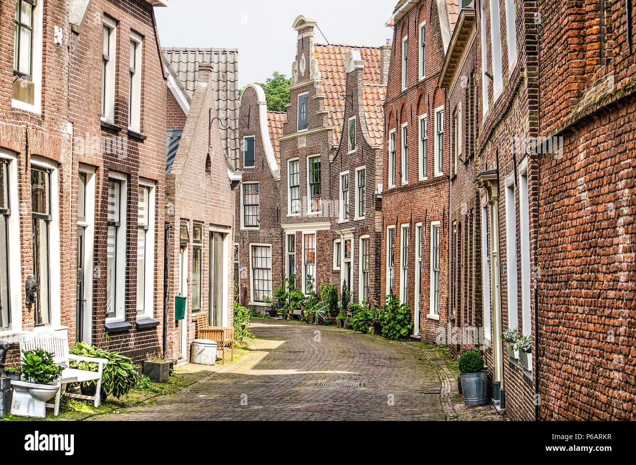 Blokzijl, The Netherlands, June 9, 2018: well-preserved ancient houses in Kerkstraat in the old town Stock Photo