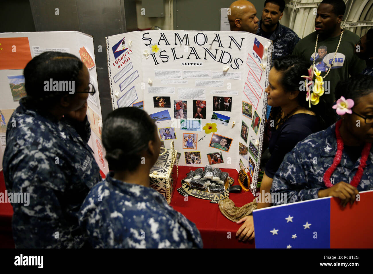 NEWPORT NEWS, Va. (May 31, 2016) --  Sailors assigned to Pre-Commissioning Unit Gerald R. Ford (CVN 78) read about culture in the Samoan Islands during the Asian American Pacific Islander Heritage Celebration in the ship’s jet shop. The month of May is recognized by the Department of the Navy as Asian American Pacific Islander Heritage Month. (U.S. Navy photo by Mass Communication Specialist Seaman Apprentice Gitte Schirrmacher/Released) Stock Photo