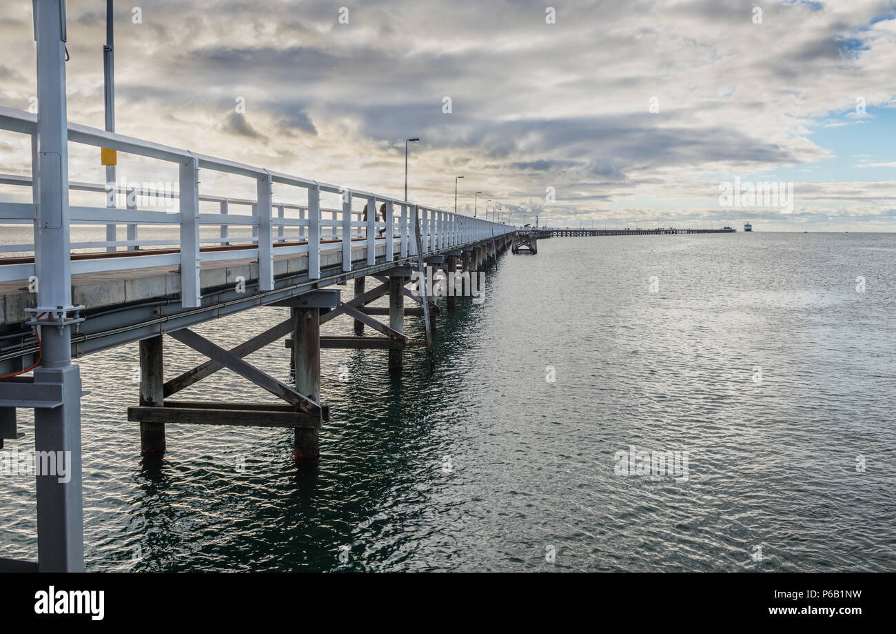 The longest wooden jetty in the world at cloudy evening.Busselton Jetty-Western Australia. Stock Photo