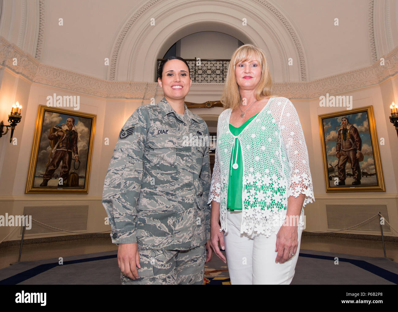Staff Sgt. Elizabeth Diaz, 502nd Logistics Readiness Squadron NCO in charge of packing and crating, and Tracey Powell, 502nd Security Forces Logistics Support Group deputy director of the commander’s action and Taj facility manager, meet in the Clark Rotunda of the Taj May 18, 2016. Powell succeeded Diaz as the facility manager and now handles day-to-day operations of the building. Stock Photo