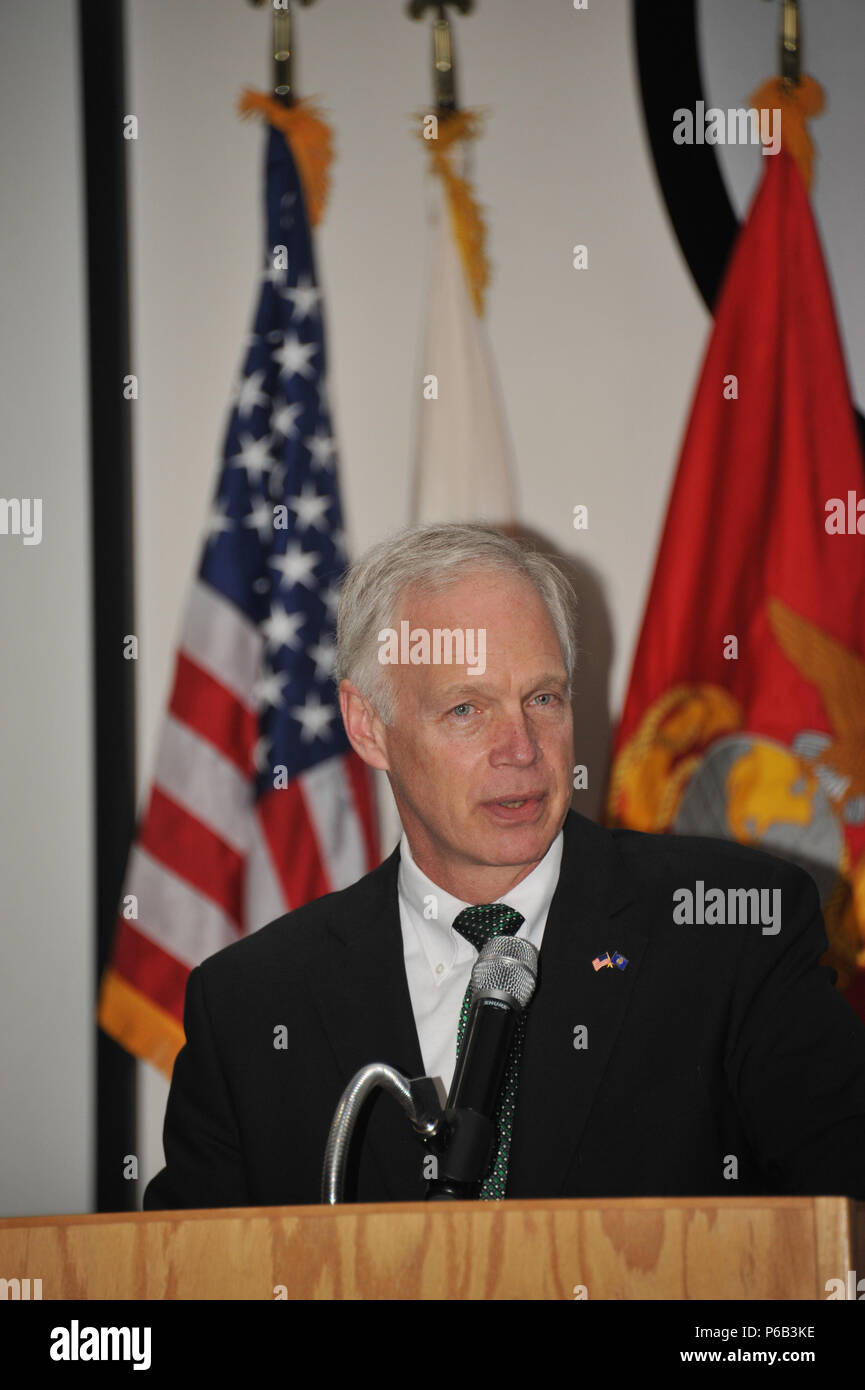 U.S. Senator Ron Johnson of Wisconsin speaks at a ceremony honoring high school seniors who have committed to elist in the armed forces at Fort McCoy, Wis. May 21, 2016.  The event entitled 'Our Community Salutes' was held at the Wisconsin Military Academy and recognized nearly 50 youth representing all five branches of the U.S. military.  U.S. Army photo by Jamal Wilson Stock Photo