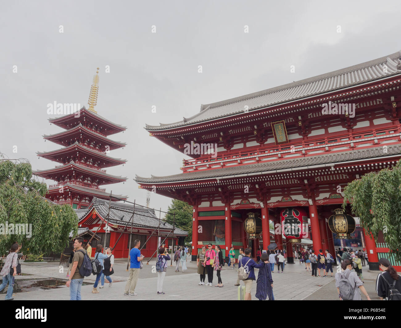 TOKYO, JAPAN - SEPTEMBER 28, 2017 : Hozomon, treasure house gate, is the famous tourist destination leads to the Senso-ji with 5 storied pagoda on the background in Asakusa Stock Photo