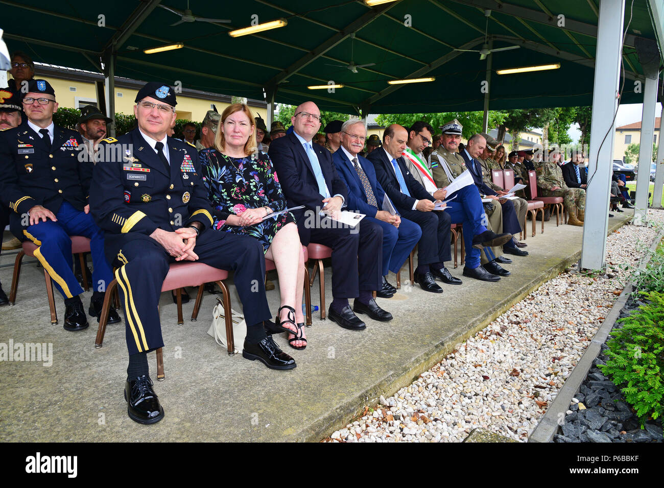 From left, General Curtis M. Scaparrotti, Supreme Allied Commander Europe (SACEUR) commander, his wife, Ambassador Philip T. Reeker, United States Consul General in Milan and distinguished guest during a  retirement ceremony at Caserma C. Ederle Vicenza, Italy, June 22, 2018. (U.S. Army photo by Paolo Bovo). Stock Photo