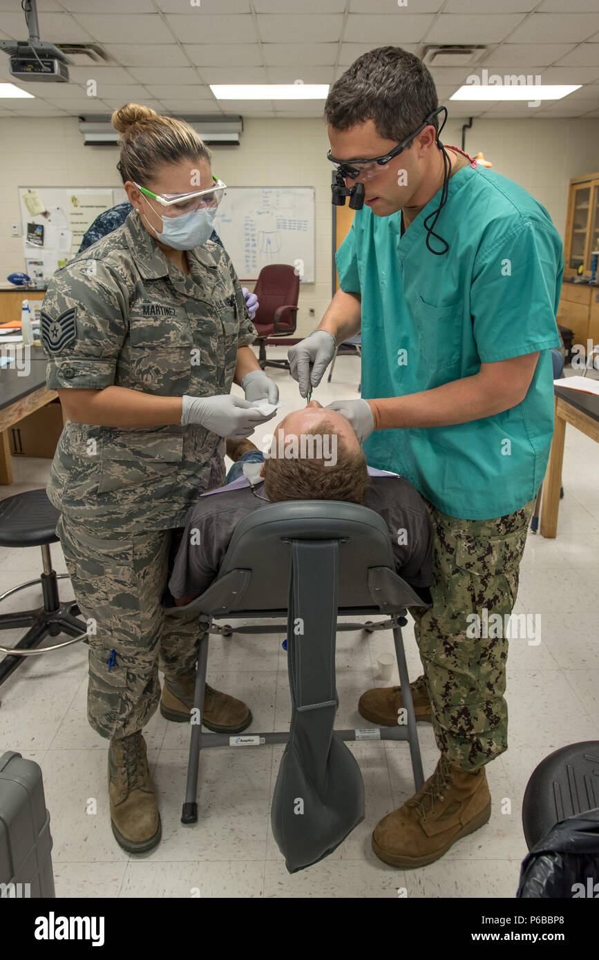U.S. Air Force Tech. Sgt. Jessica Martinez (left), a dental technician